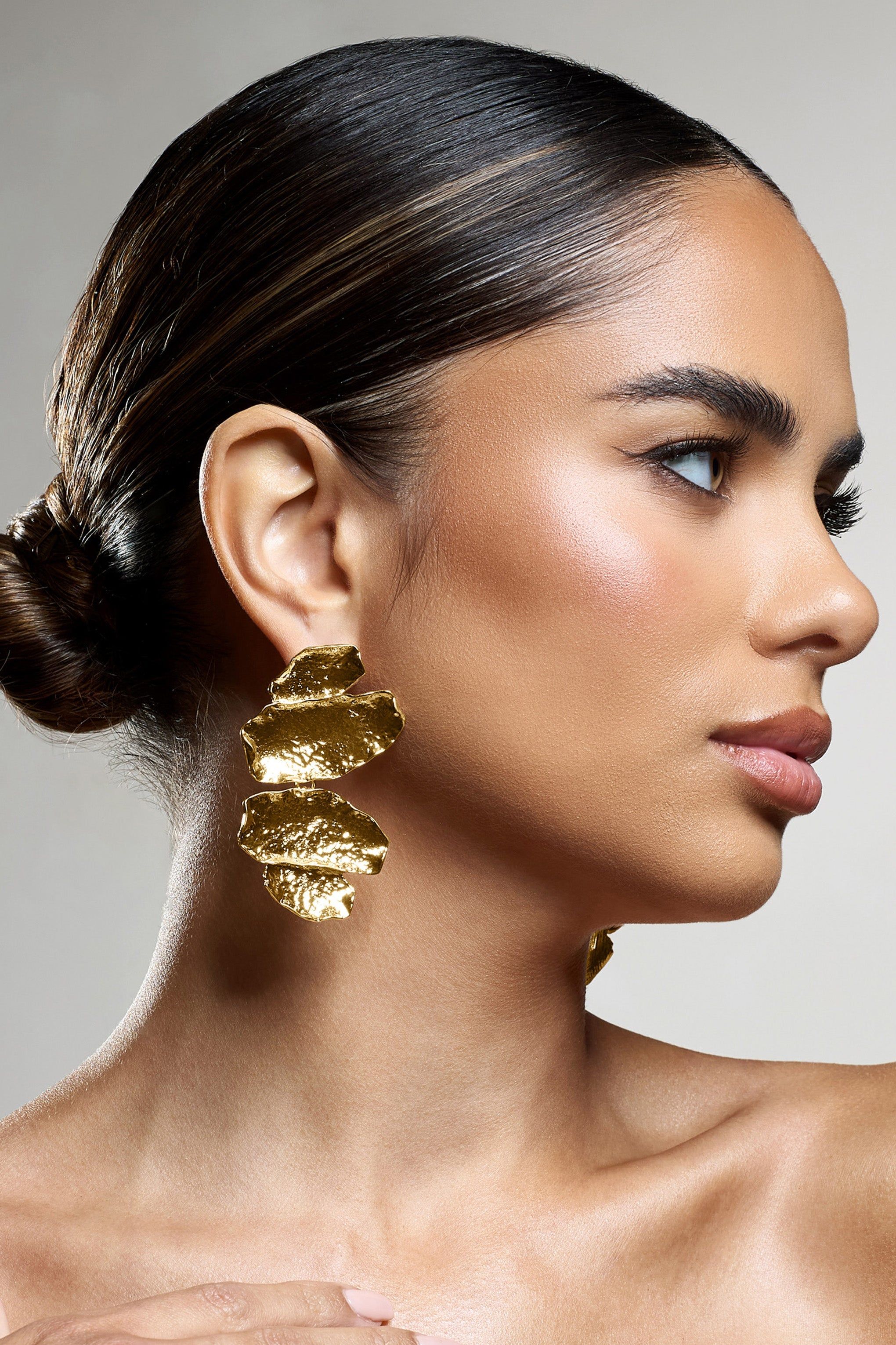 Sierra Madre | Gold Textured Abstract Drop Earrings sold by Club L London product image thumbnail 3