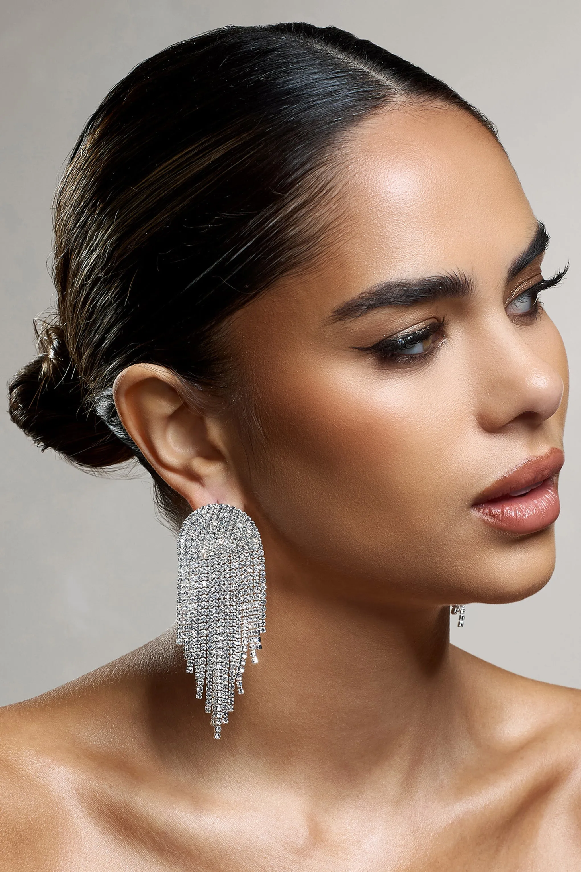 Waterfall | Silver Diamante Tassel Earrings sold by Club L London
