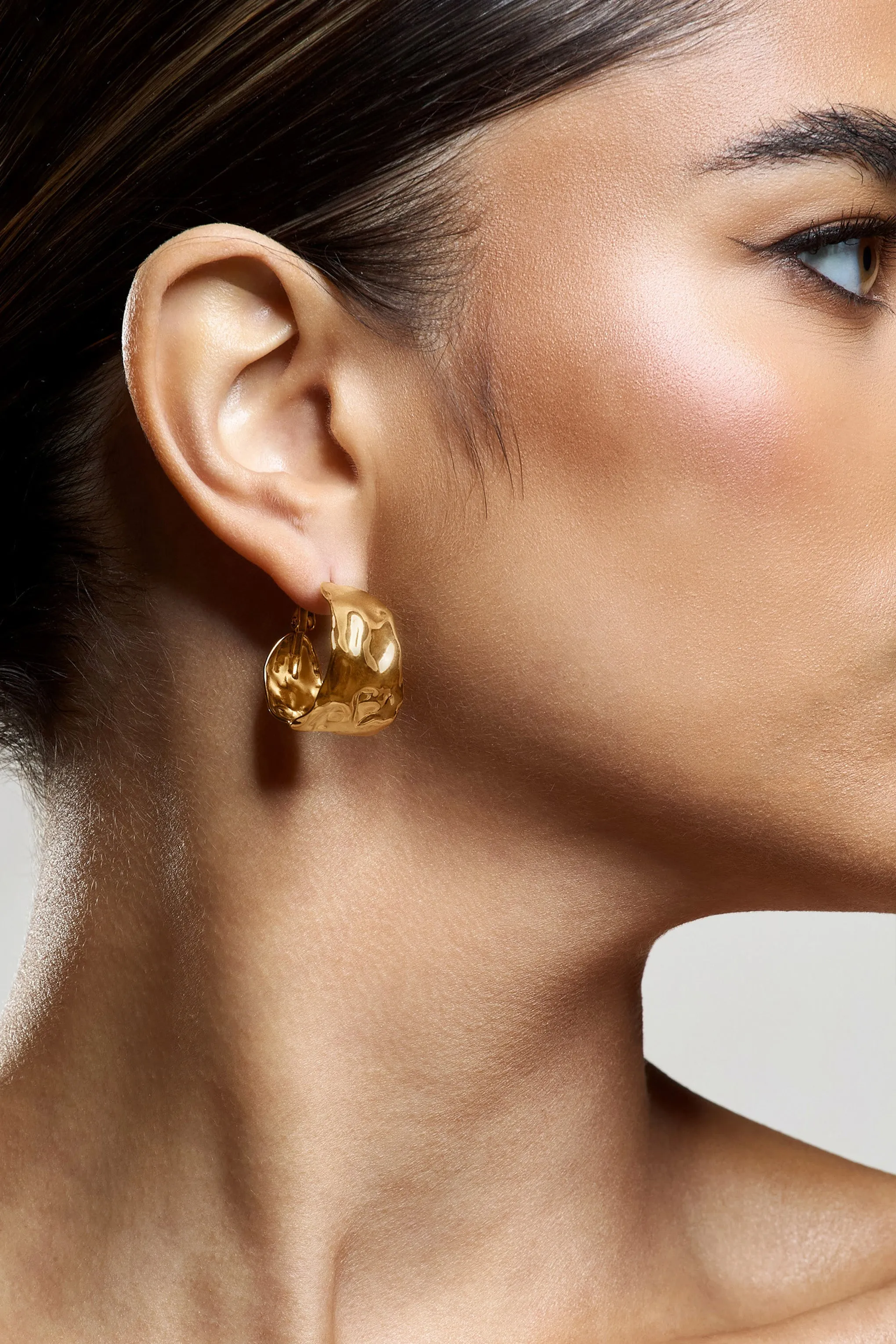 Kiki | Gold Hoop Earrings With Hammered Finish sold by Club L London product image thumbnail 4