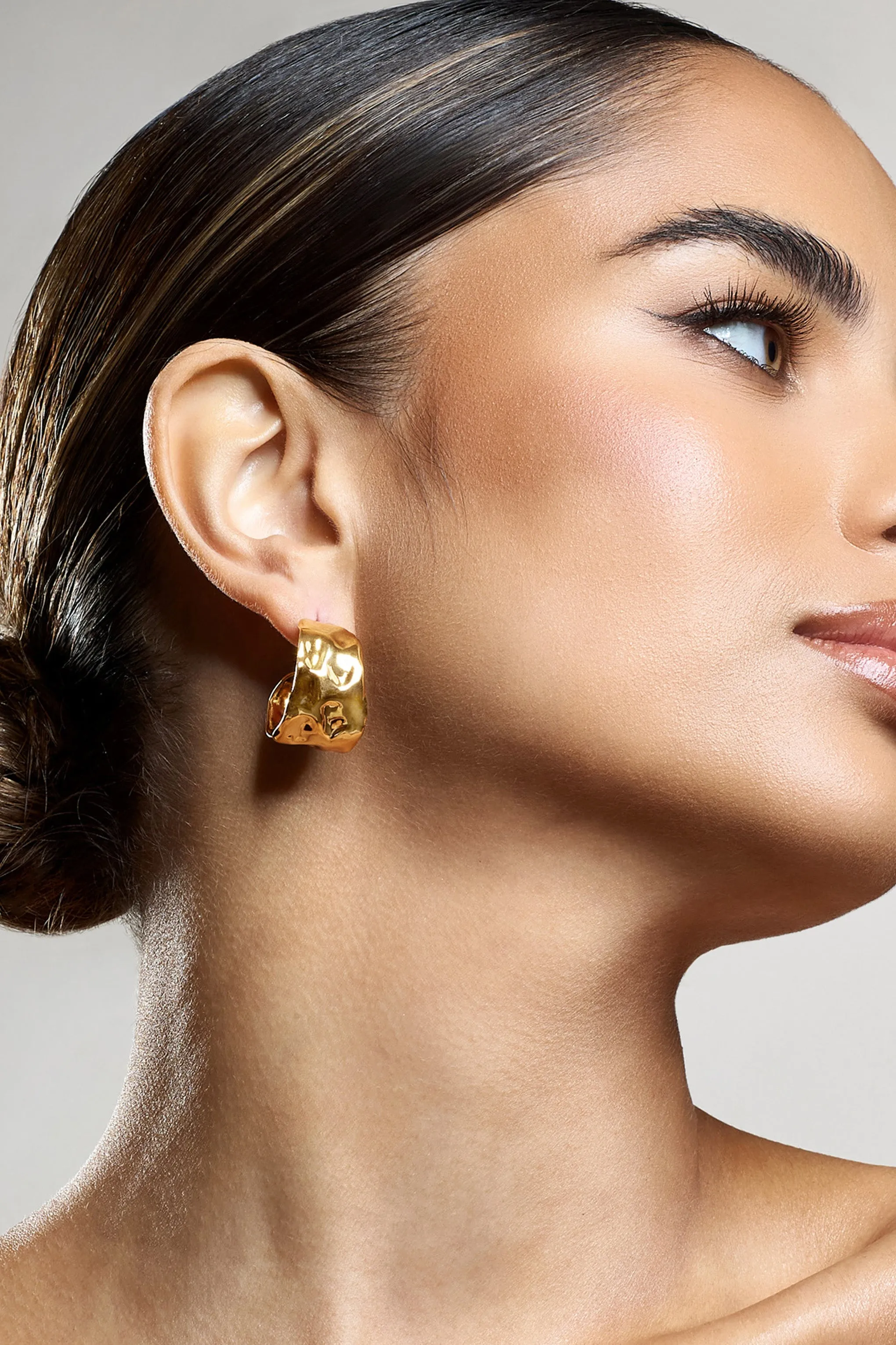 Kiki | Gold Hoop Earrings With Hammered Finish sold by Club L London product image thumbnail 3