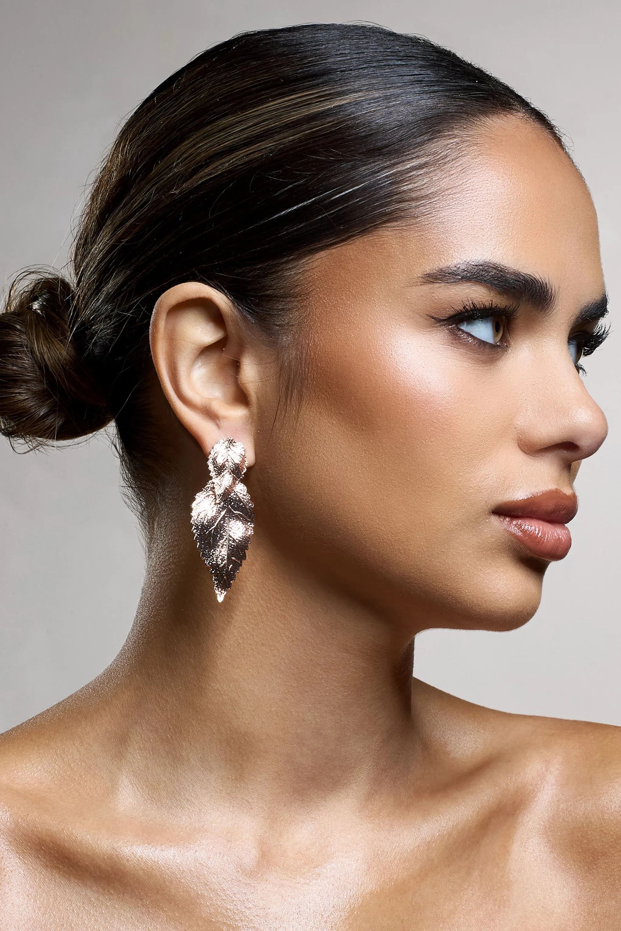 Hazel | Golf Leaf Dangle Earrings sold by Club L London