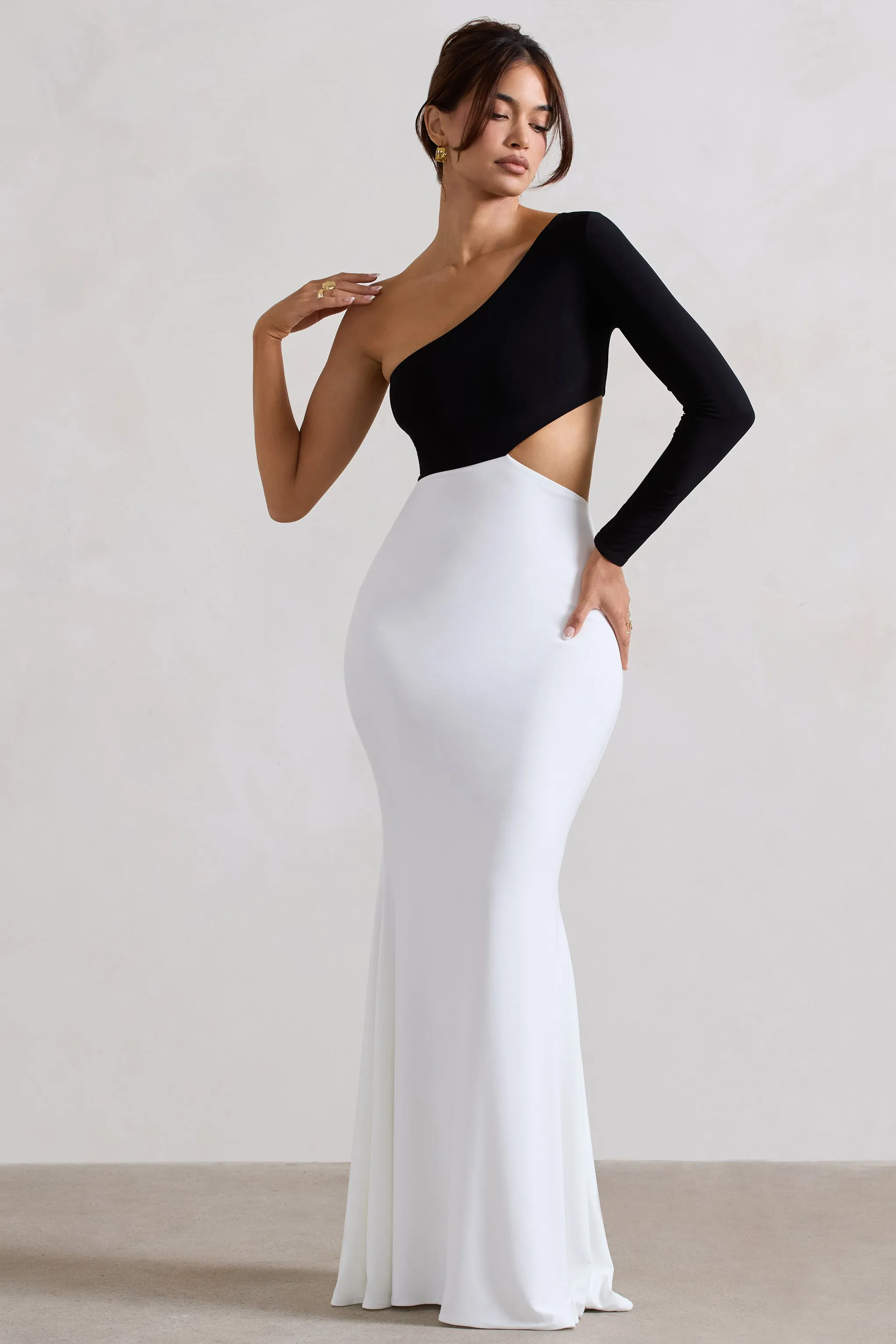 Nantes | Black & White Asymmetric One-Sleeve Cut-Out Maxi Dress sold by Club L London