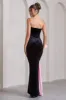 Best Wishes | Black Velvet Bandeau Split Maxi Dress With Oversized Pink Bow sold by Club L London