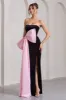 Best Wishes | Black Velvet Bandeau Split Maxi Dress With Oversized Pink Bow sold by Club L London