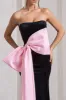 Best Wishes | Black Velvet Bandeau Split Maxi Dress With Oversized Pink Bow sold by Club L London