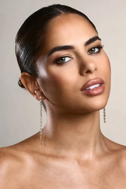 Admire | Gold Diamante Dangle Earrings sold by Club L London