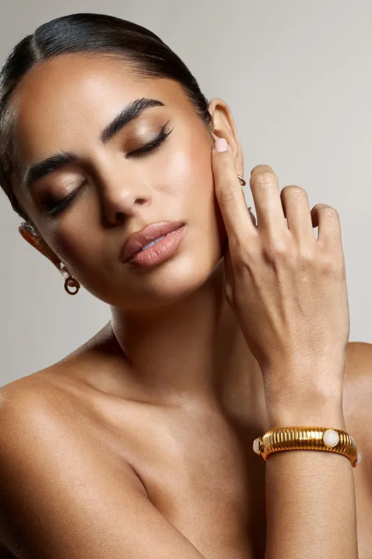 Adrianne | Gold Bracelet With Nude Pendants sold by Club L London