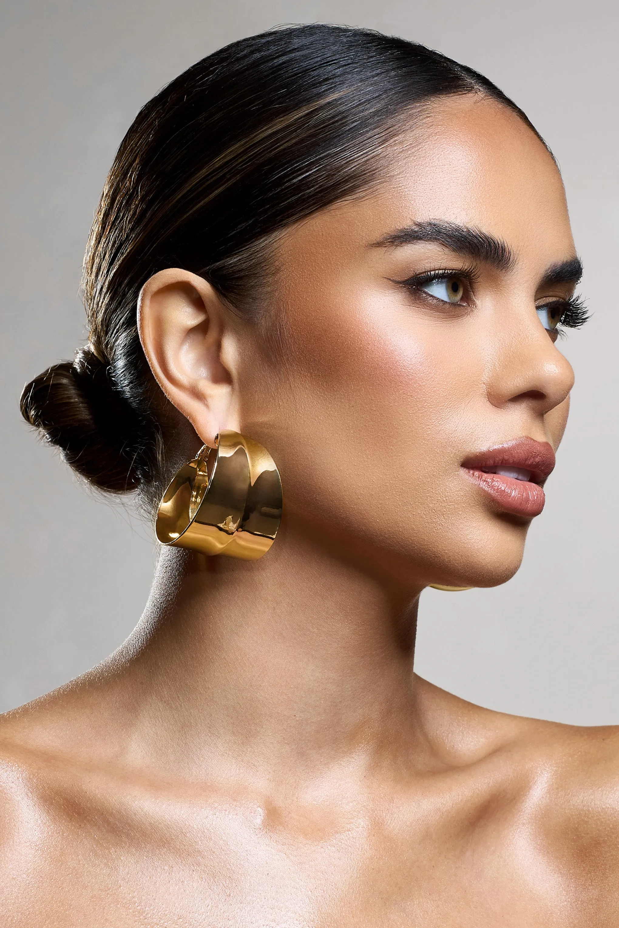 Amberly | Gold Chunky Statement Hoop Earrings sold by Club L London