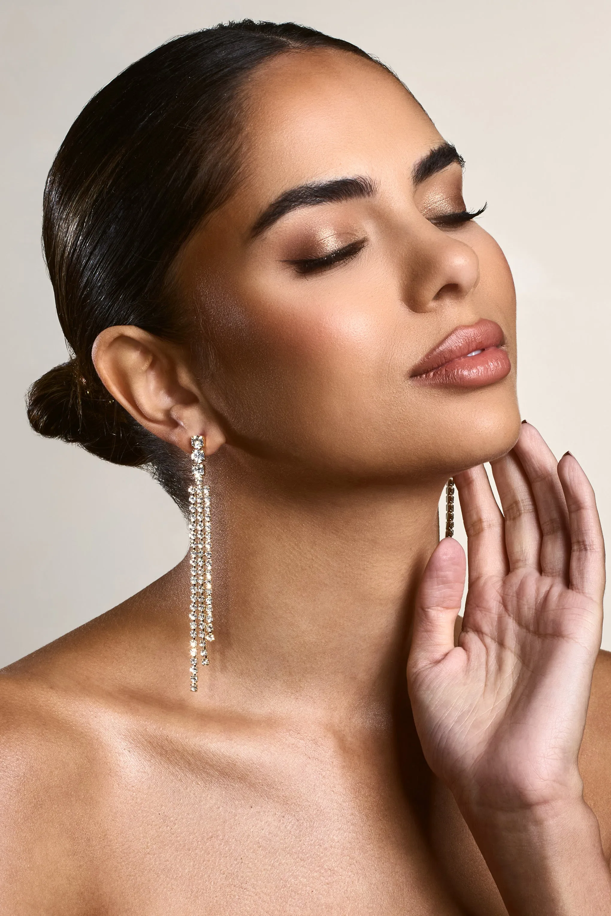 Glint | Gold Diamante Tassel Earrings sold by Club L London product image thumbnail 2