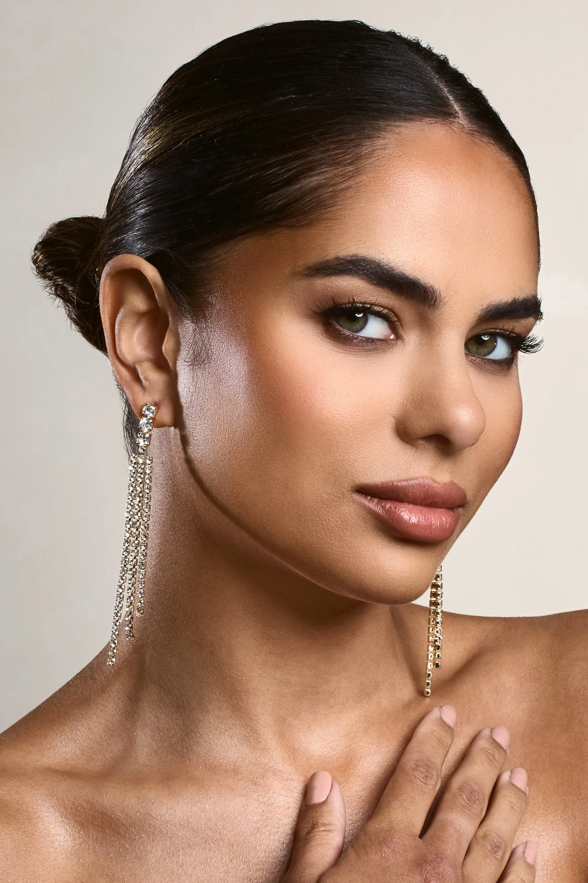 Glint | Gold Diamante Tassel Earrings sold by Club L London product image thumbnail 4