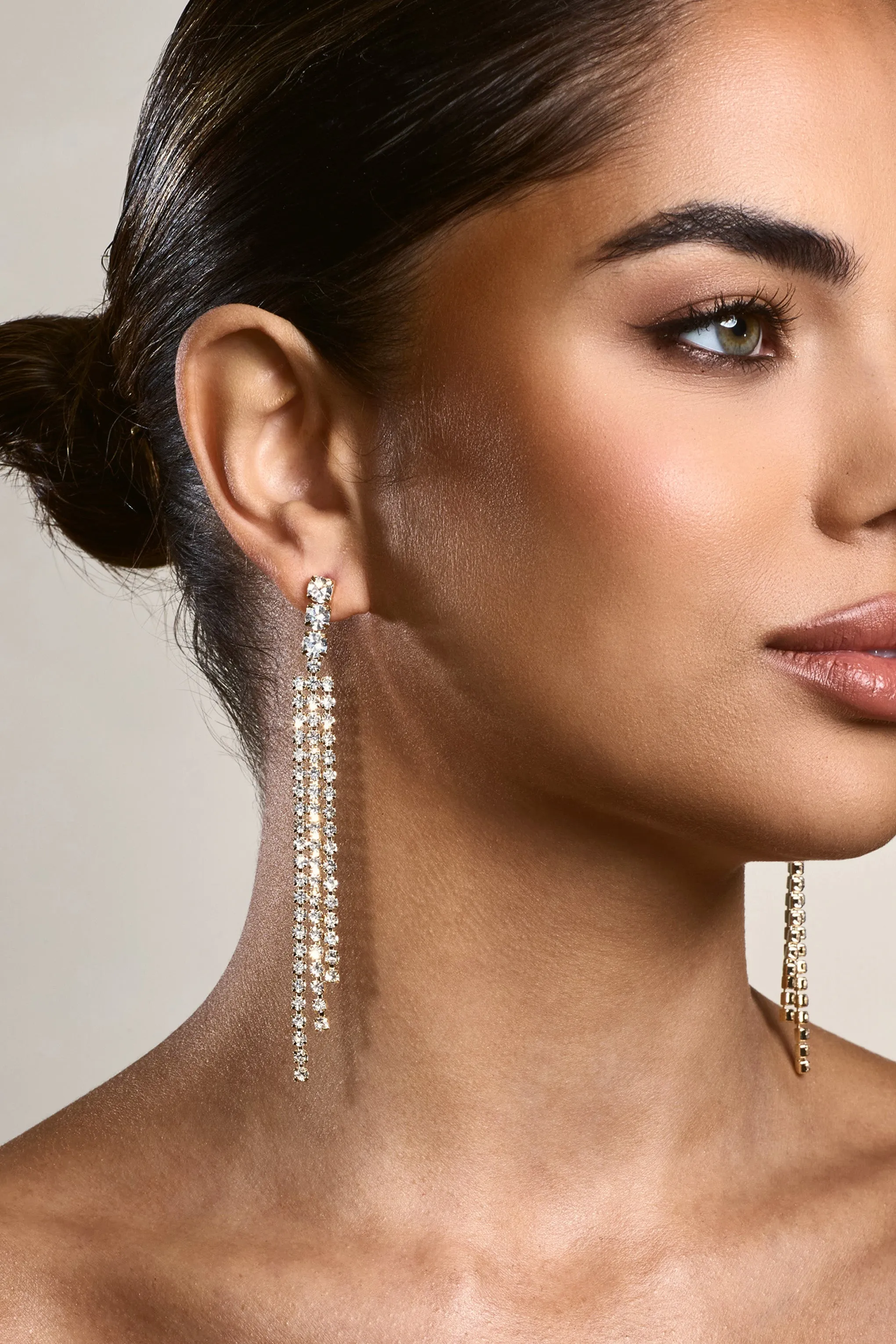 Glint | Gold Diamante Tassel Earrings sold by Club L London product image thumbnail 5