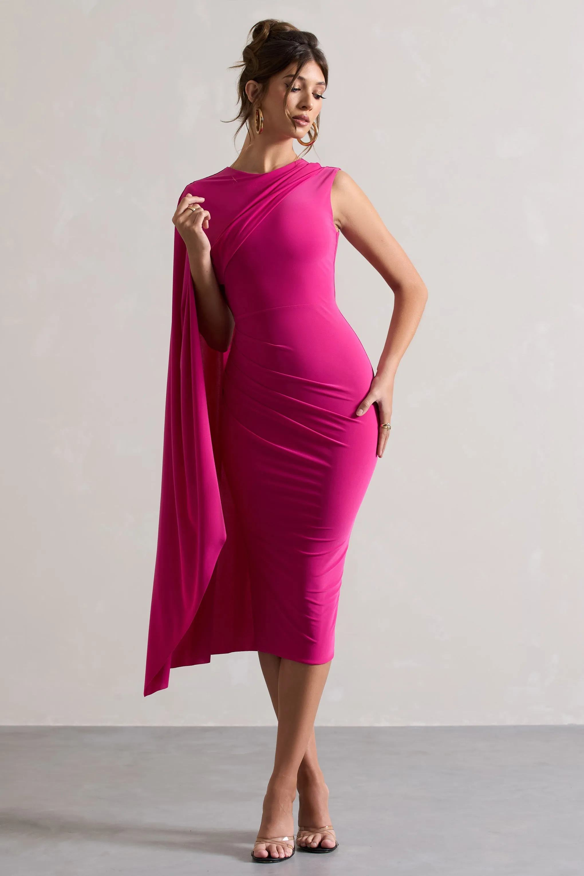 Reveal | Dark Pink One-Sleeve Cape Midi Dress sold by Club L London