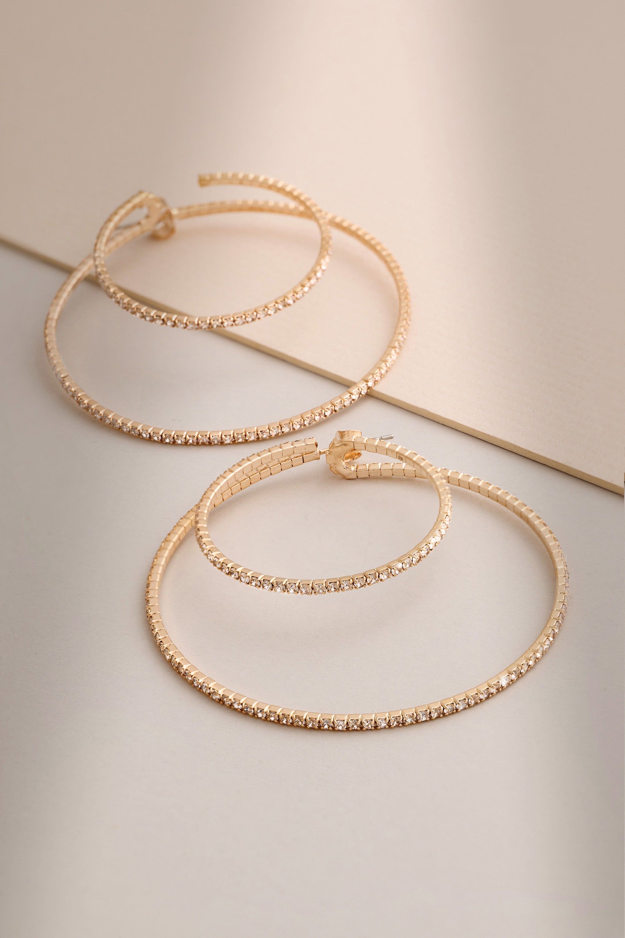 Sammie | Gold Thin Hoop Earrings sold by Club L London