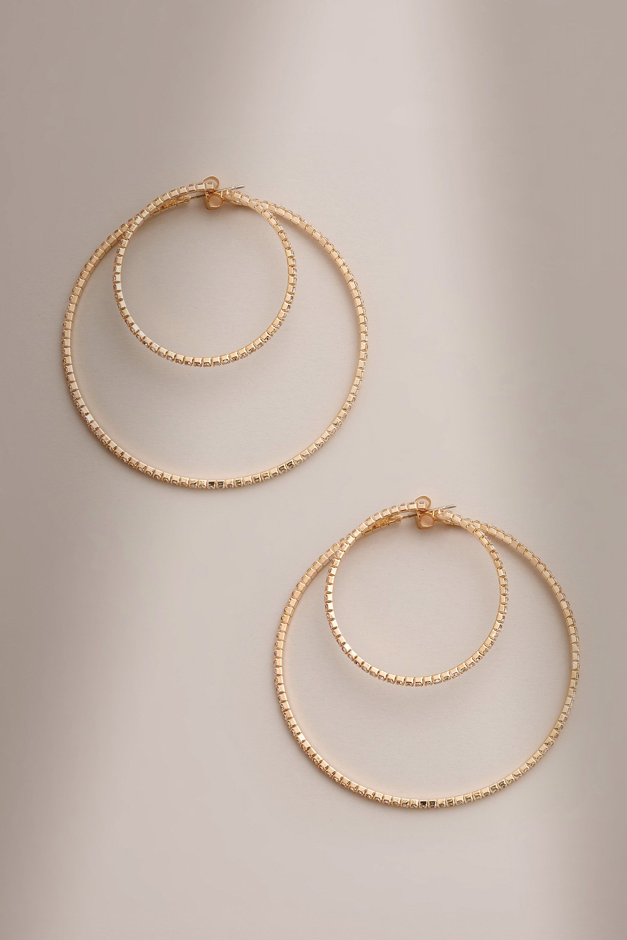 Sammie | Gold Thin Hoop Earrings sold by Club L London product image thumbnail 3