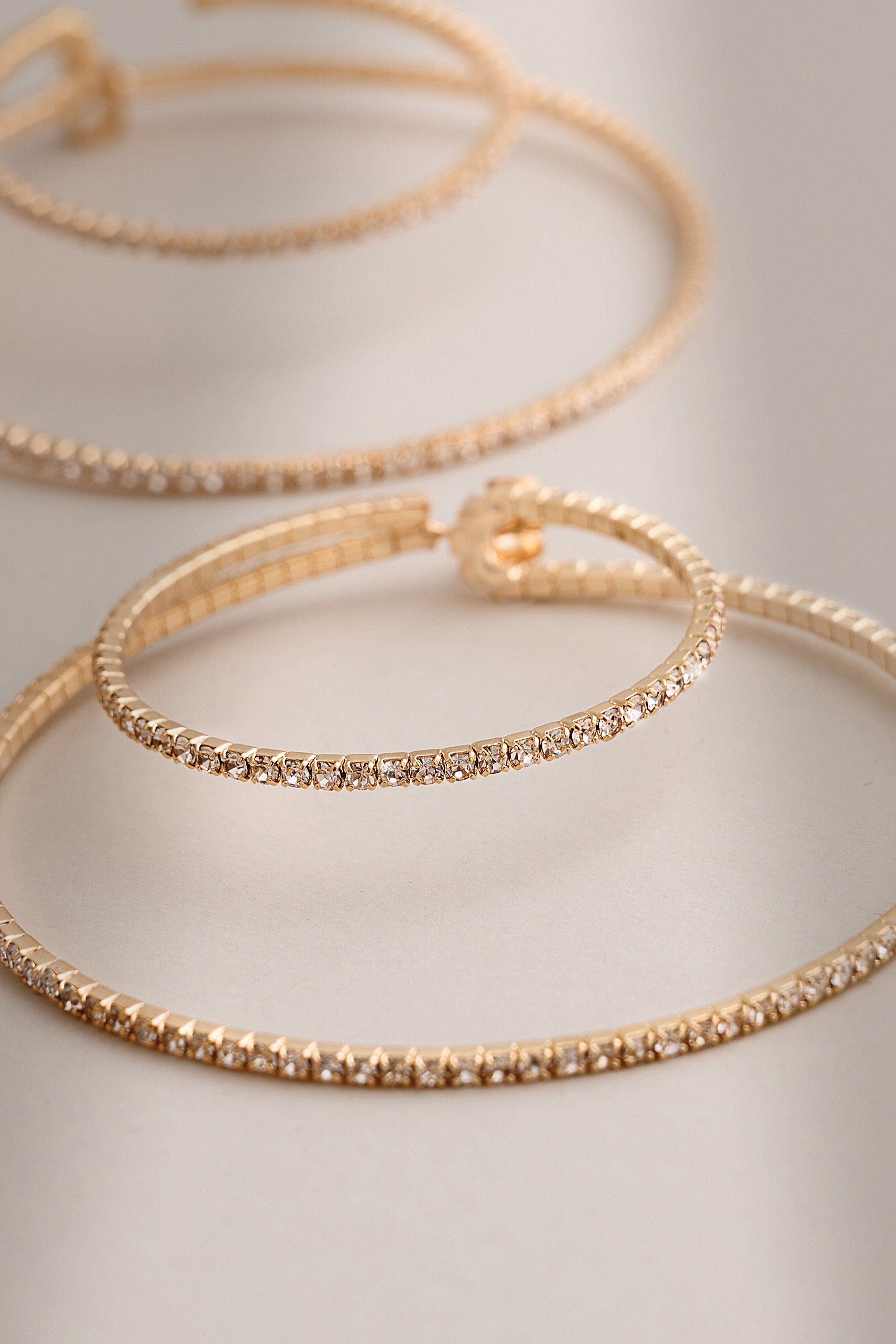 Sammie | Gold Thin Hoop Earrings sold by Club L London product image thumbnail 2