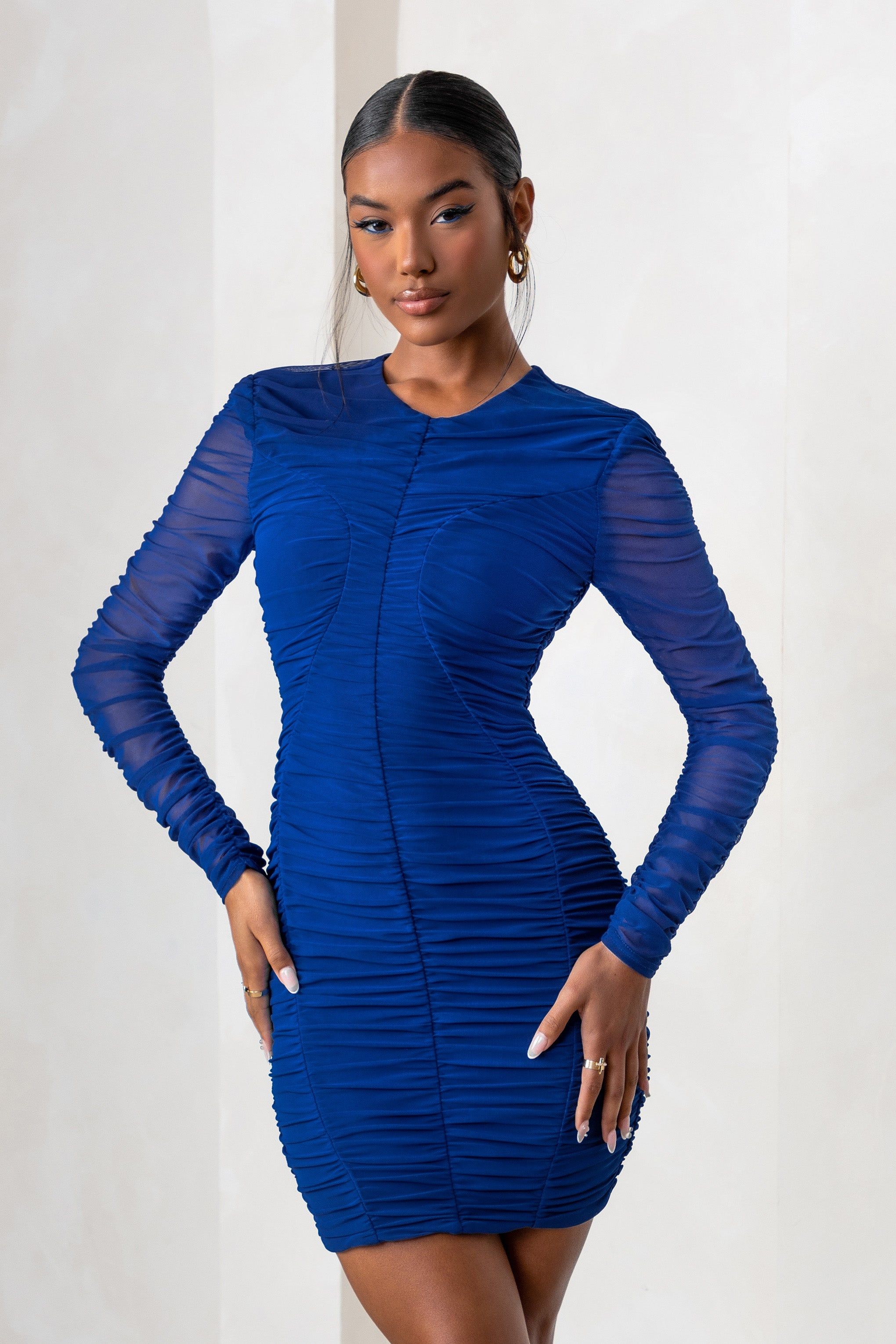 Euphoria | Royal Blue Ruched Mesh Long Sleeve Mini Dress sold by Club L London