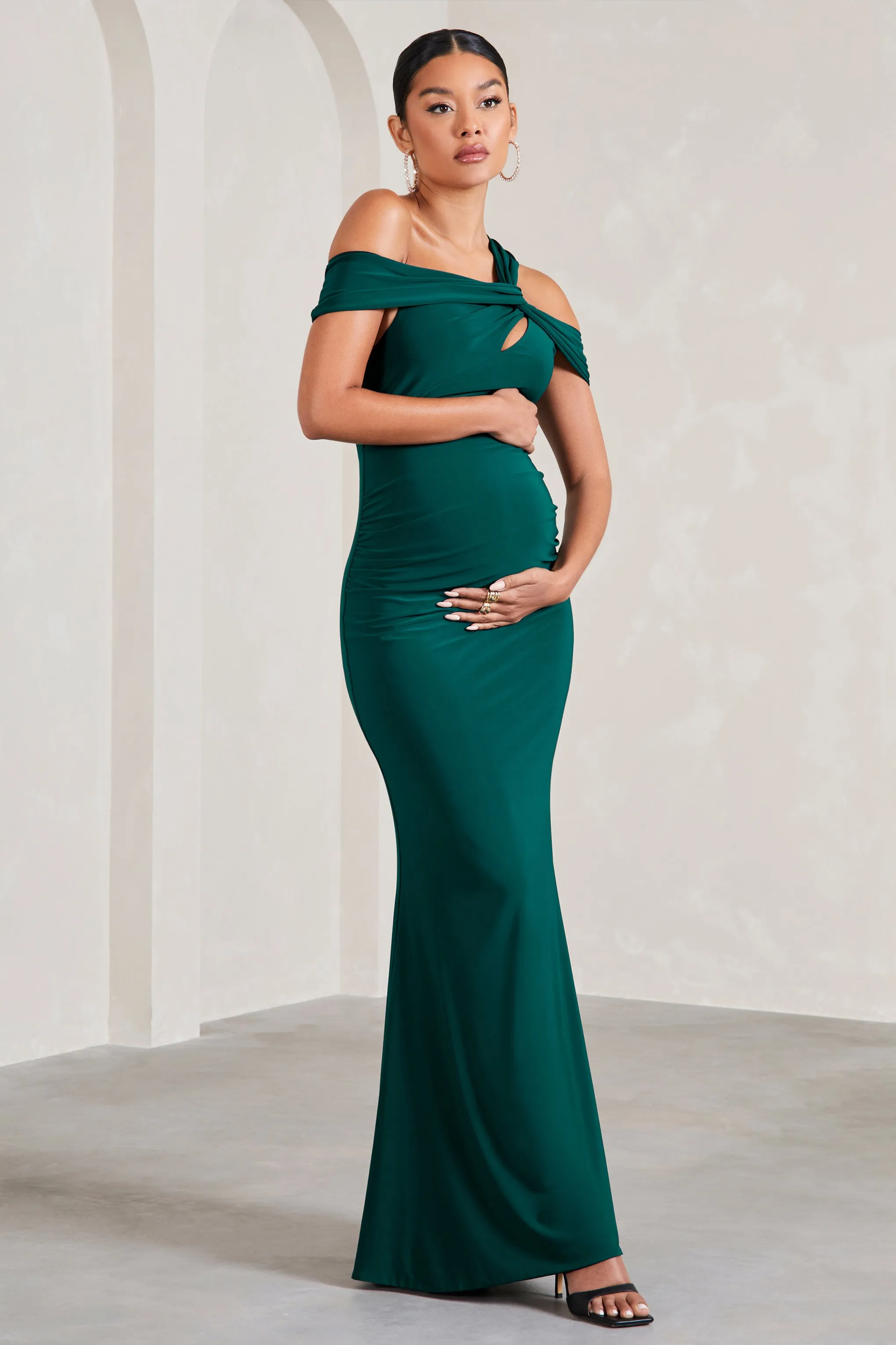 Captivating | Bottle Green Strappy Asymmetric Cut-Out Maternity Maxi Dress sold by Club L London