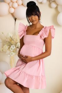 Dolly Daze | Pink Maternity Ruffle Sleeve Babydoll Mini Dress sold by Club L London