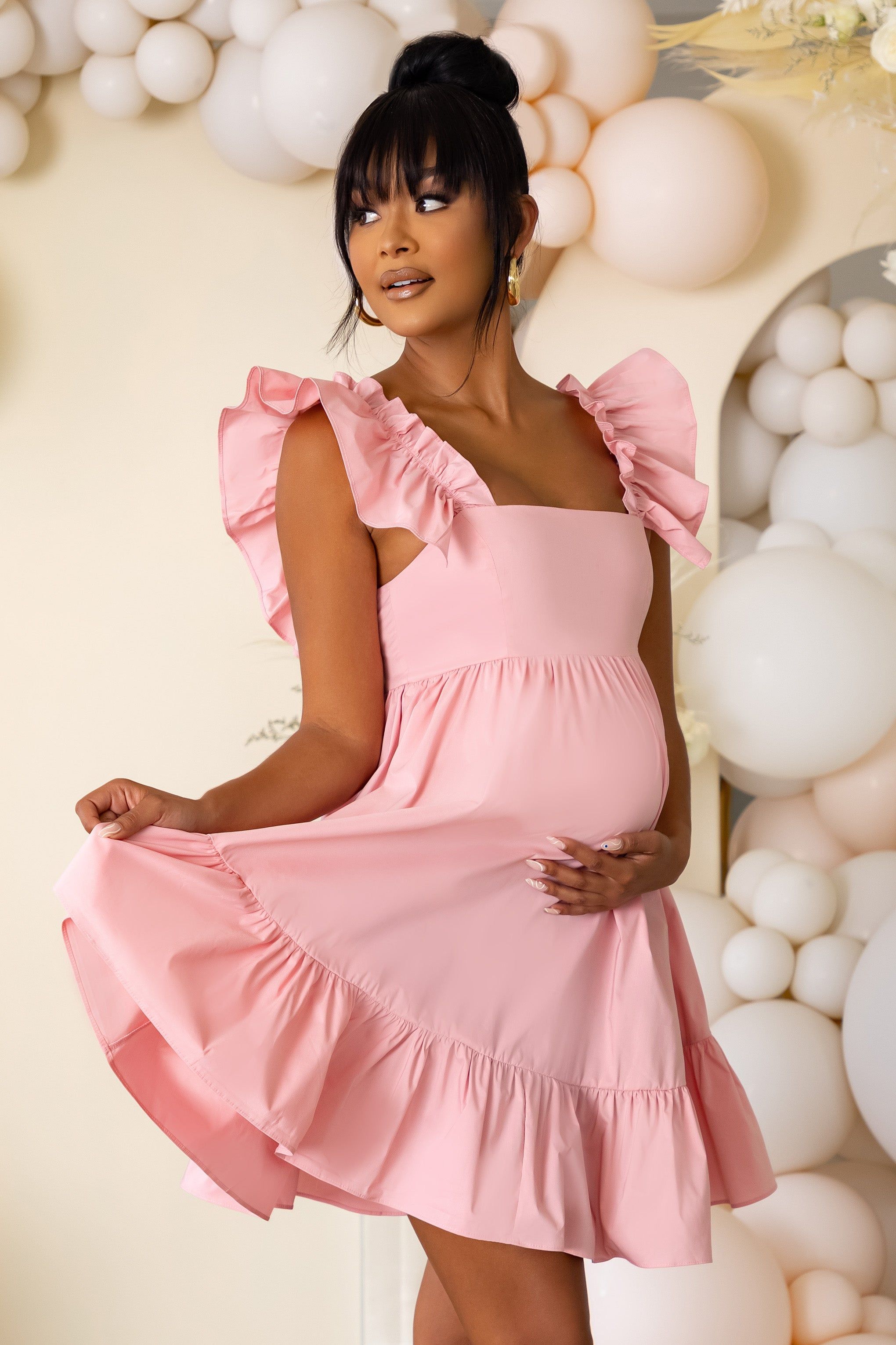 Dolly Daze | Pink Maternity Ruffle Sleeve Babydoll Mini Dress sold by Club L London