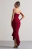Sandy | Berry Strapless Corset Asymmetric Maxi Dress sold by Club L London