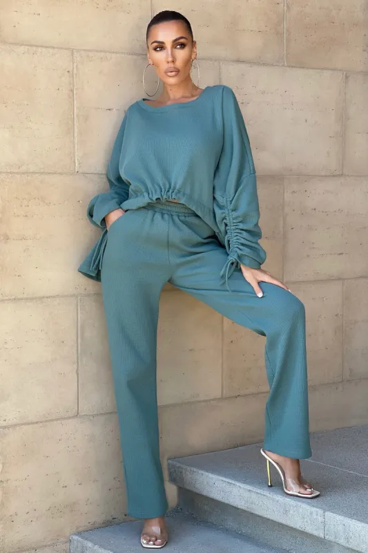 Empower | Teal Relaxed Tie Waist Wide Leg Trousers sold by Club L London