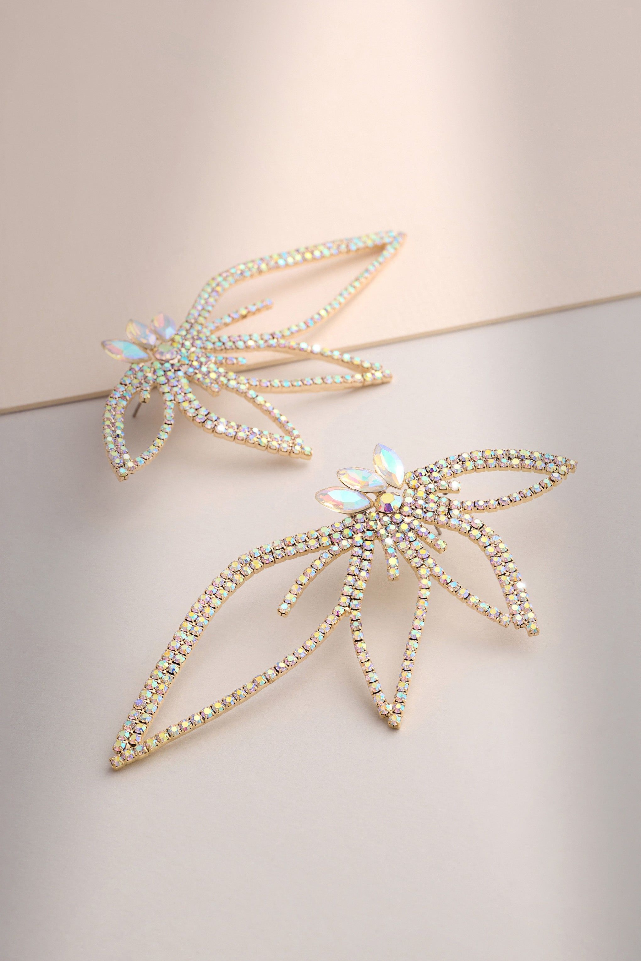 Lucie | Gold Statement Diamante Earrings sold by Club L London