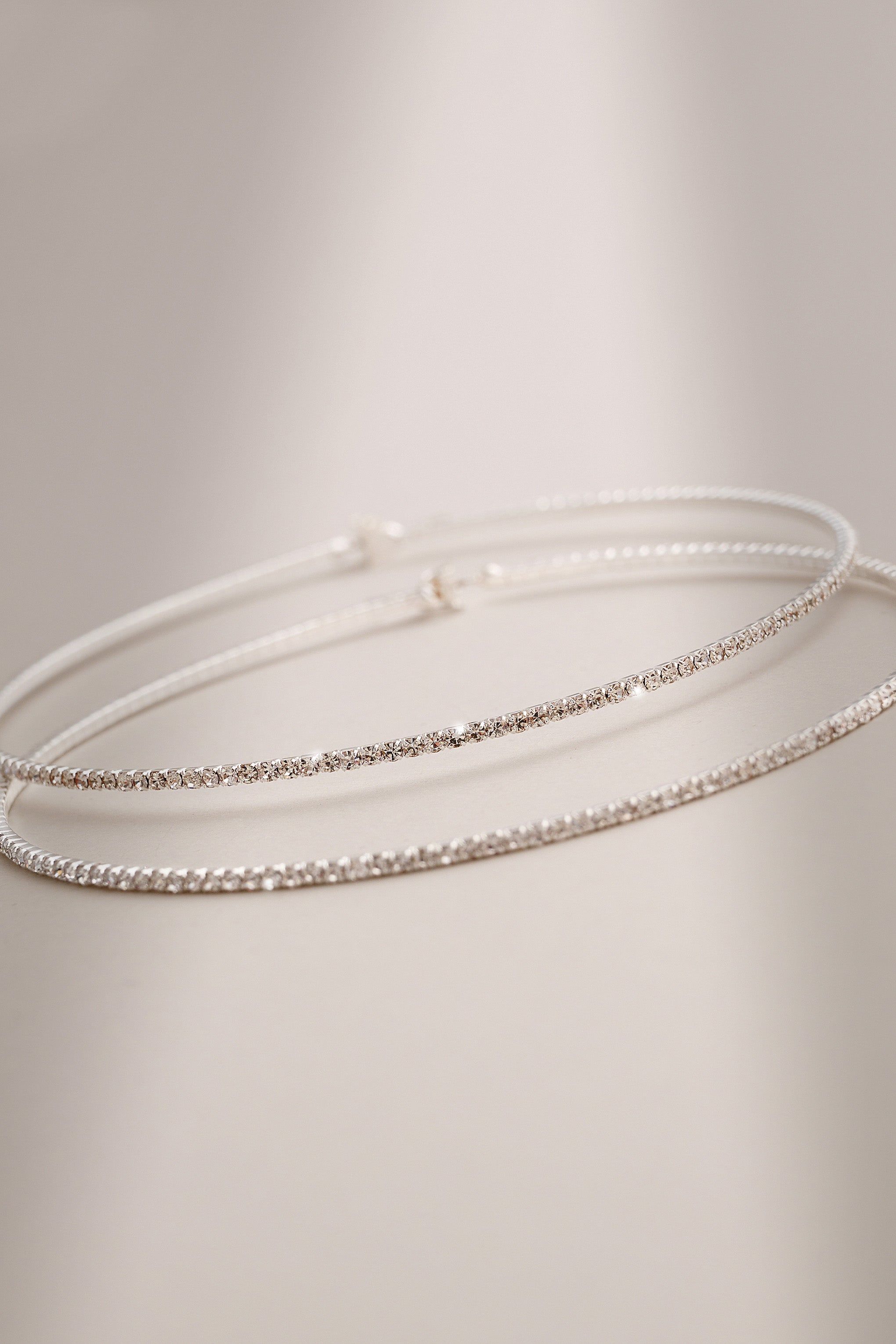 Rosey | Silver Diamante Thin Hoop Earrings sold by Club L London product image thumbnail 2