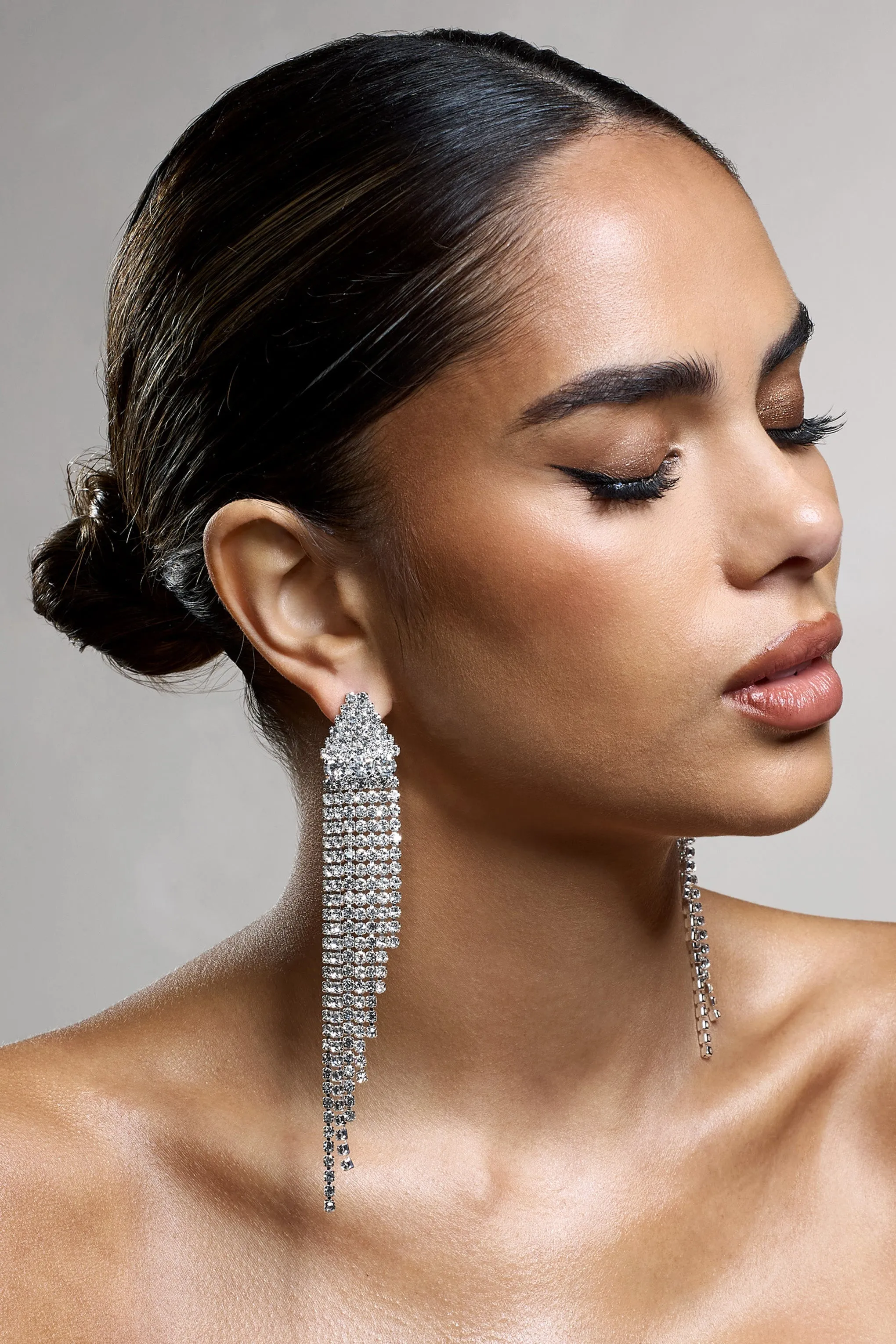 Prosper | Silver Diamante Tassel Earrings sold by Club L London