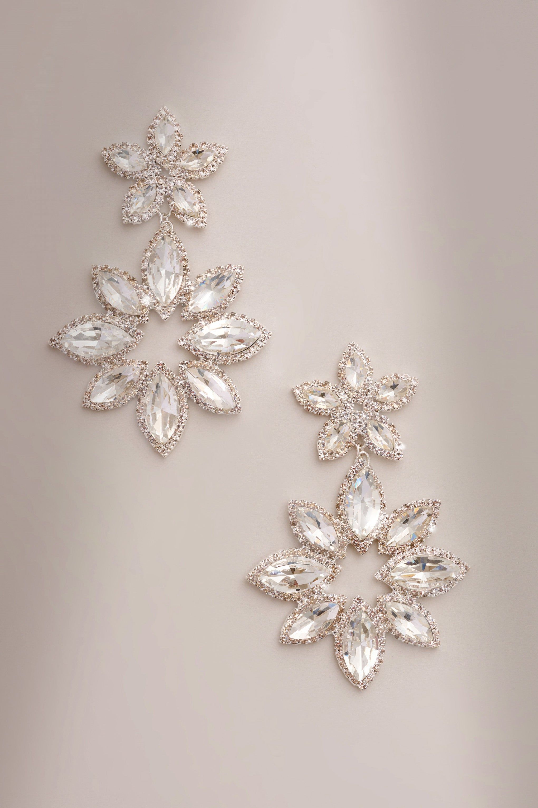 Maura | Silver Diamante Flower Statement Earrings sold by Club L London product image thumbnail 4