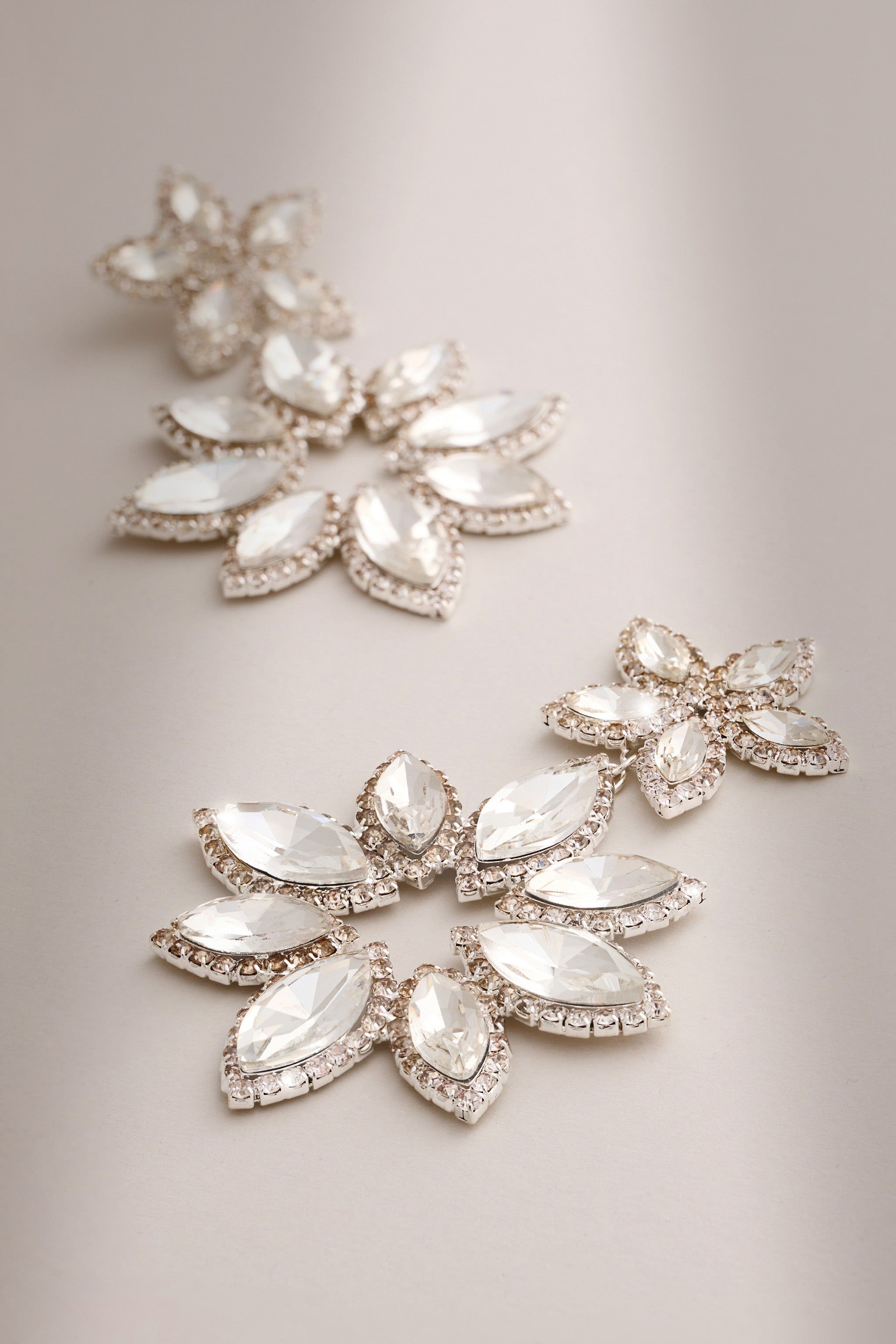 Maura | Silver Diamante Flower Statement Earrings sold by Club L London product image thumbnail 3