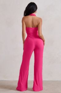 Goddess | Hot Pink Halter Neck Flare Jumpsuit sold by Club L London