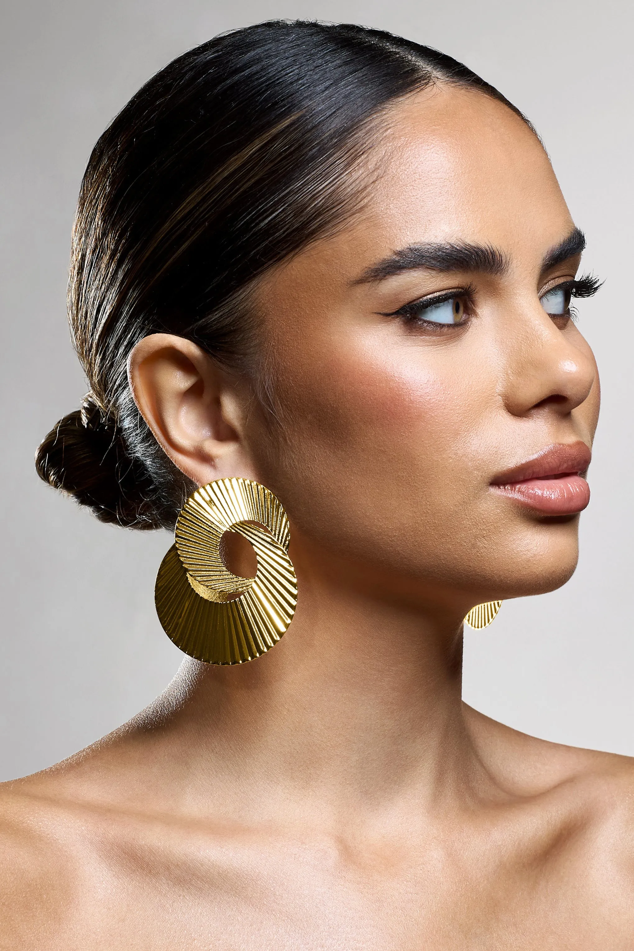 Lenora | Gold Ribbed Layered Circle Earrings sold by Club L London product image thumbnail 3