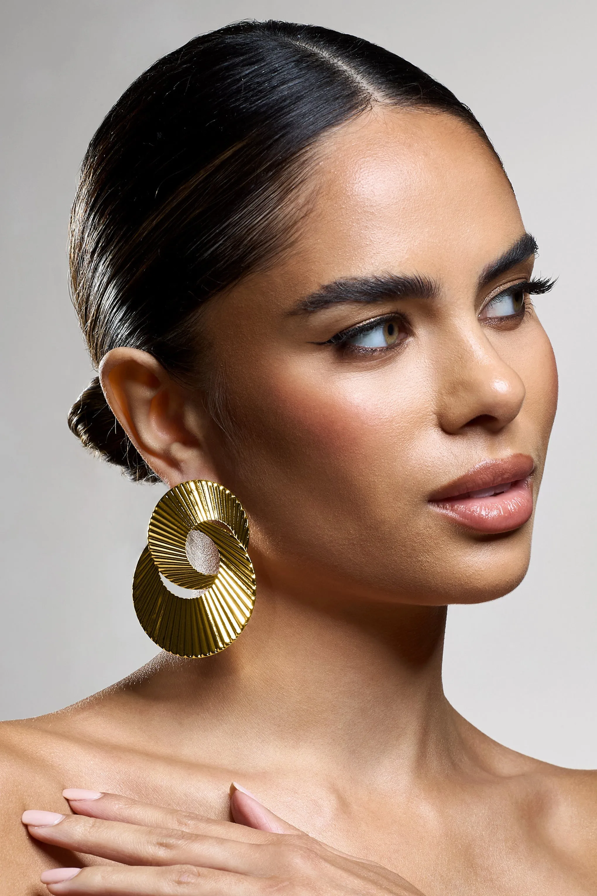 Lenora | Gold Ribbed Layered Circle Earrings sold by Club L London product image thumbnail 5