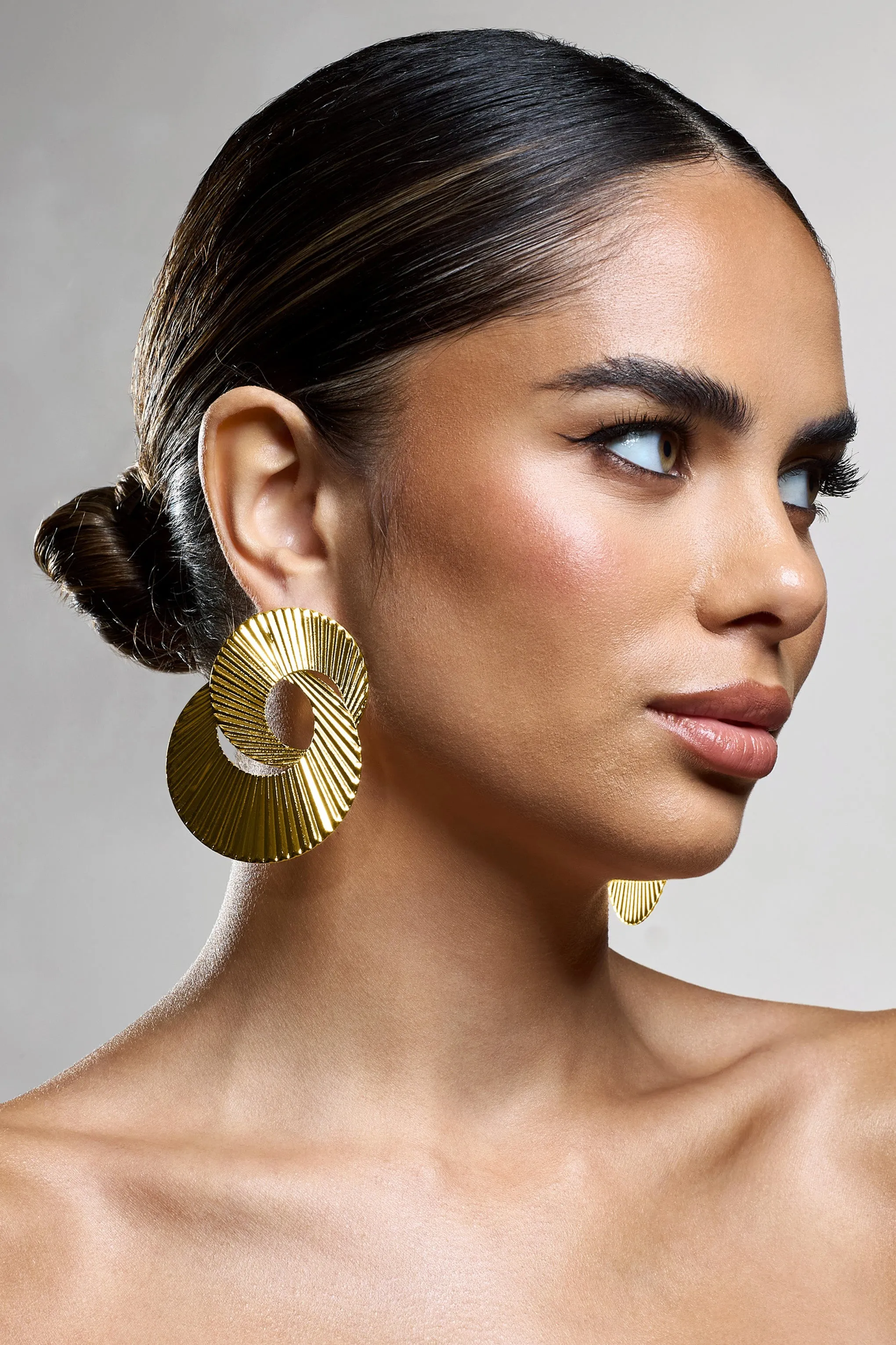 Lenora | Gold Ribbed Layered Circle Earrings sold by Club L London product image thumbnail 4