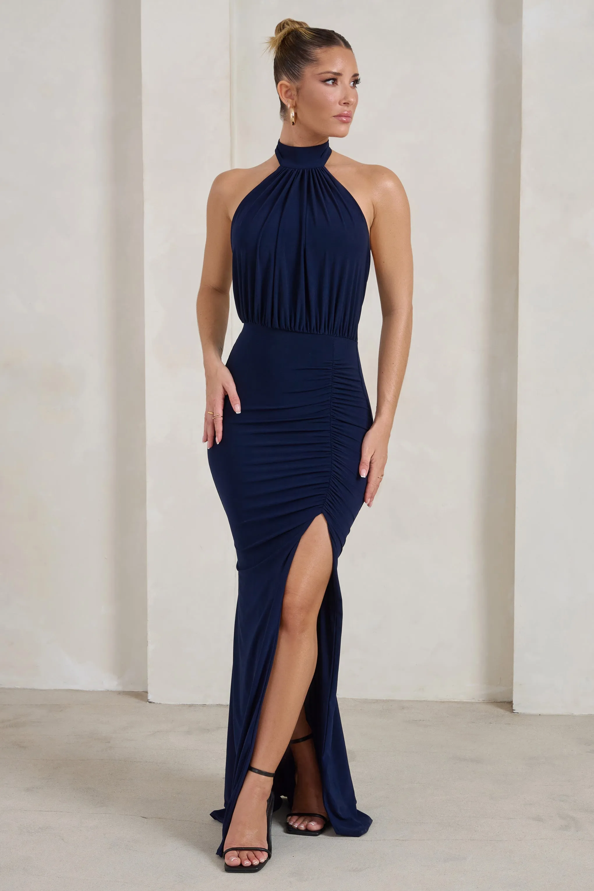Forever Dreaming | Navy Backless Halterneck Ruched Split Maxi Dress sold by Club L London
