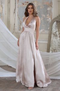 Darling | Champagne Satin Halter Neck Bow Back Thigh Split Maxi Dress sold by Club L London