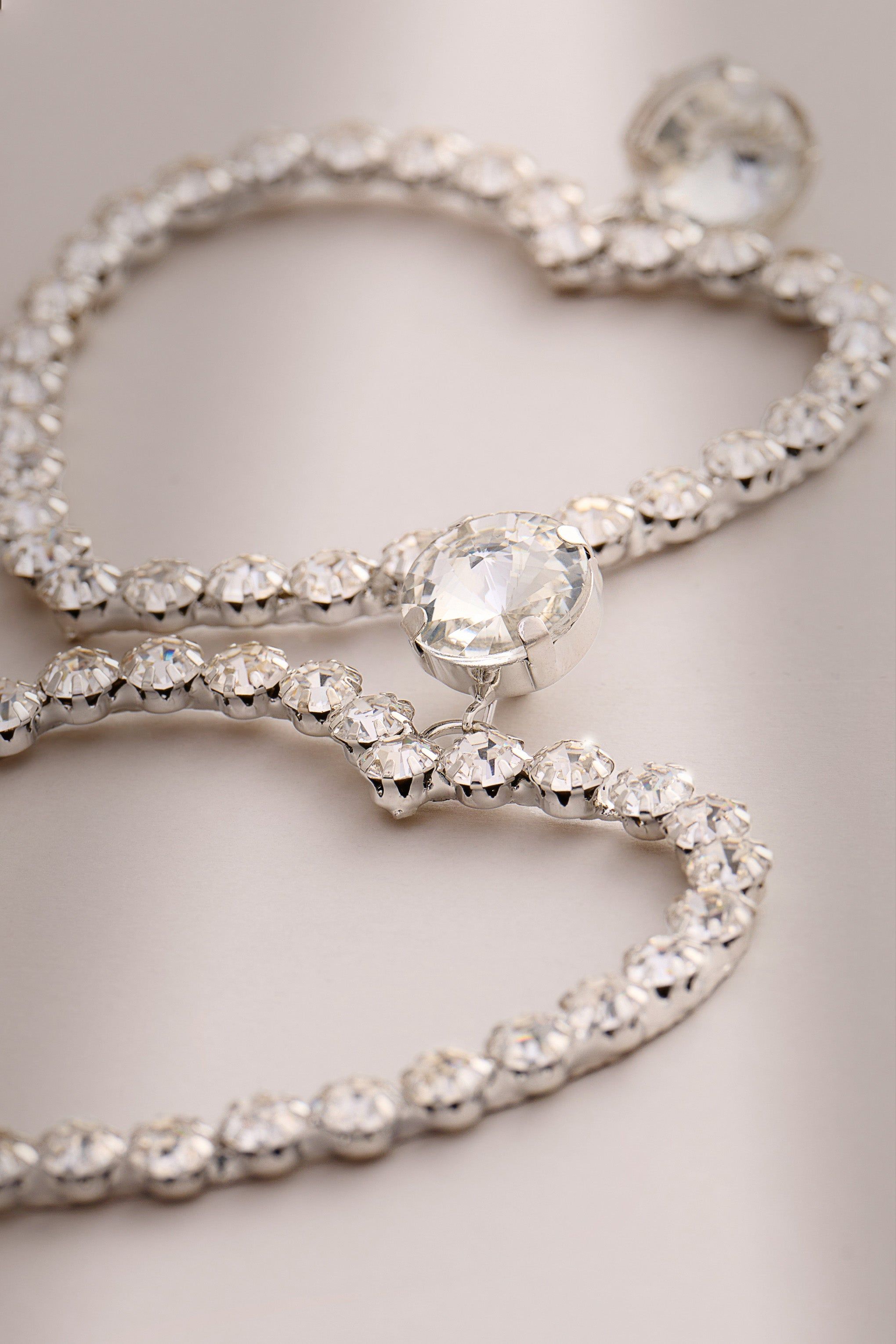 Lia | Silver Diamante Heart Hoop Drop Earrings sold by Club L London product image thumbnail 2