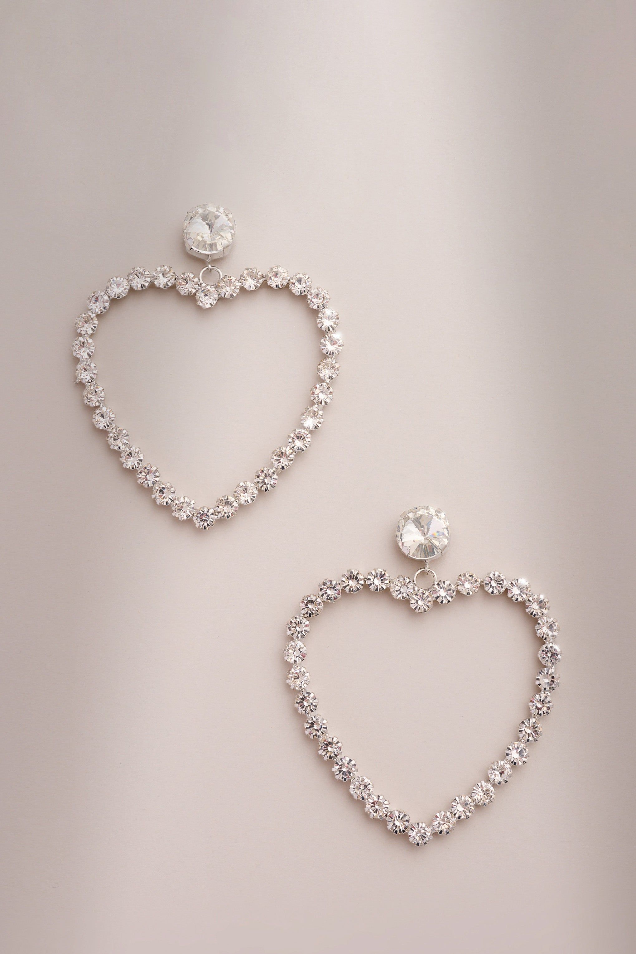 Lia | Silver Diamante Heart Hoop Drop Earrings sold by Club L London product image thumbnail 3