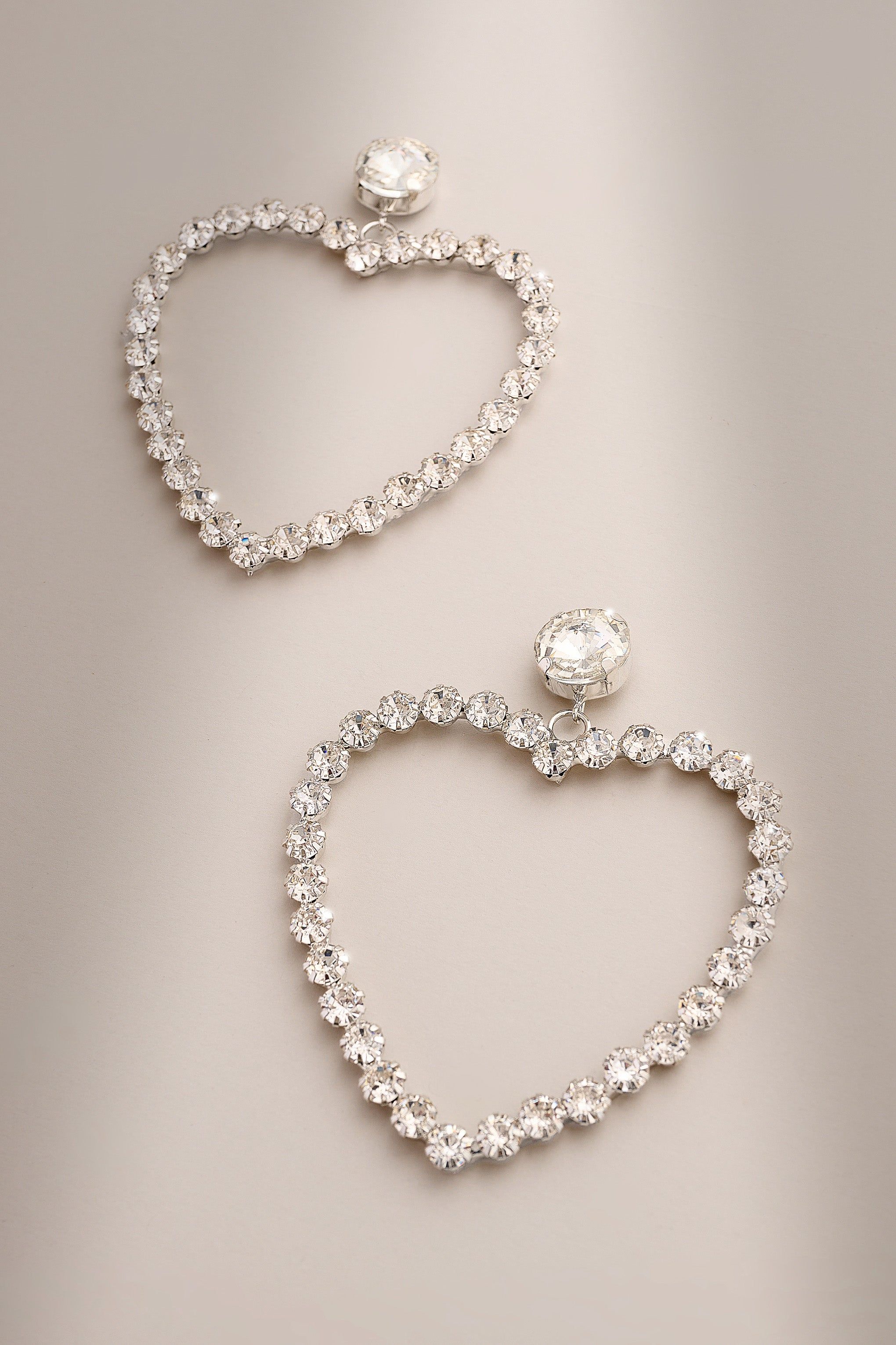 Lia | Silver Diamante Heart Hoop Drop Earrings sold by Club L London product image thumbnail 4