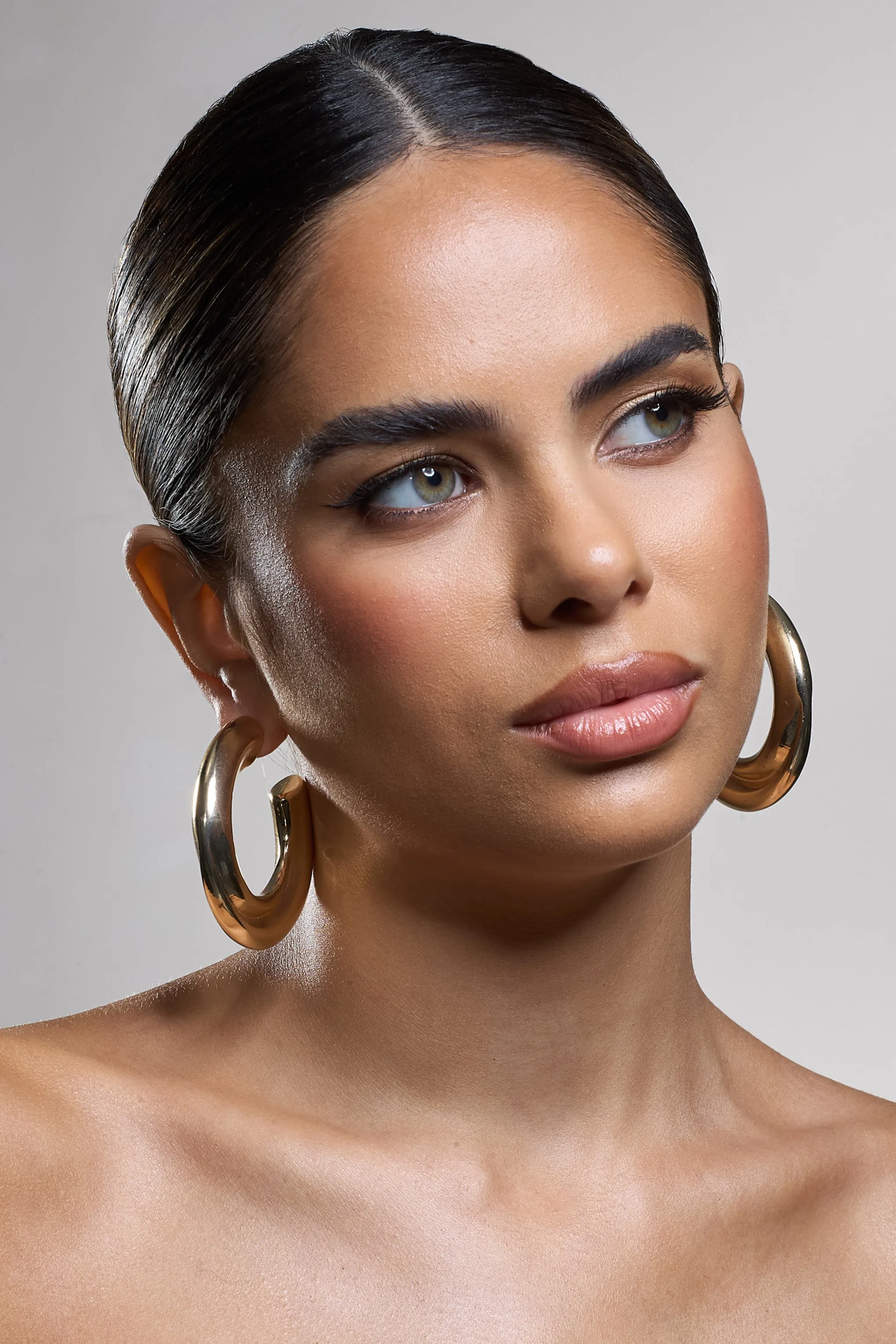 Ennis | Gold Chunky Hoop Earrings sold by Club L London product image thumbnail 3