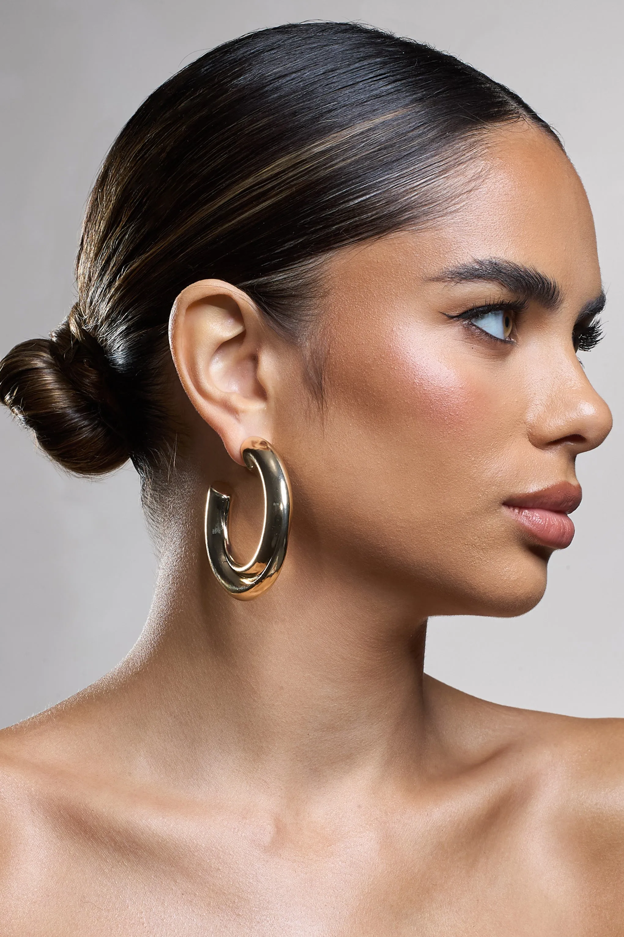 Ennis | Gold Chunky Hoop Earrings sold by Club L London