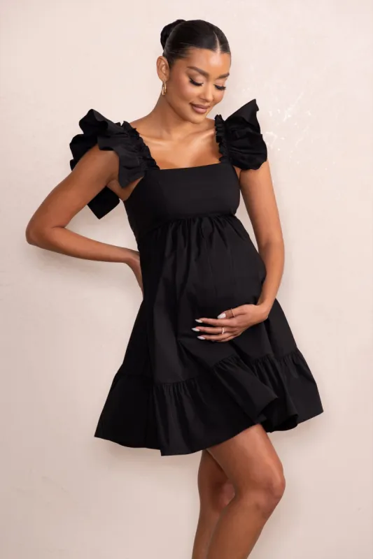 Dolly Daze | Black Maternity Ruffle Mini Dress sold by Club L London