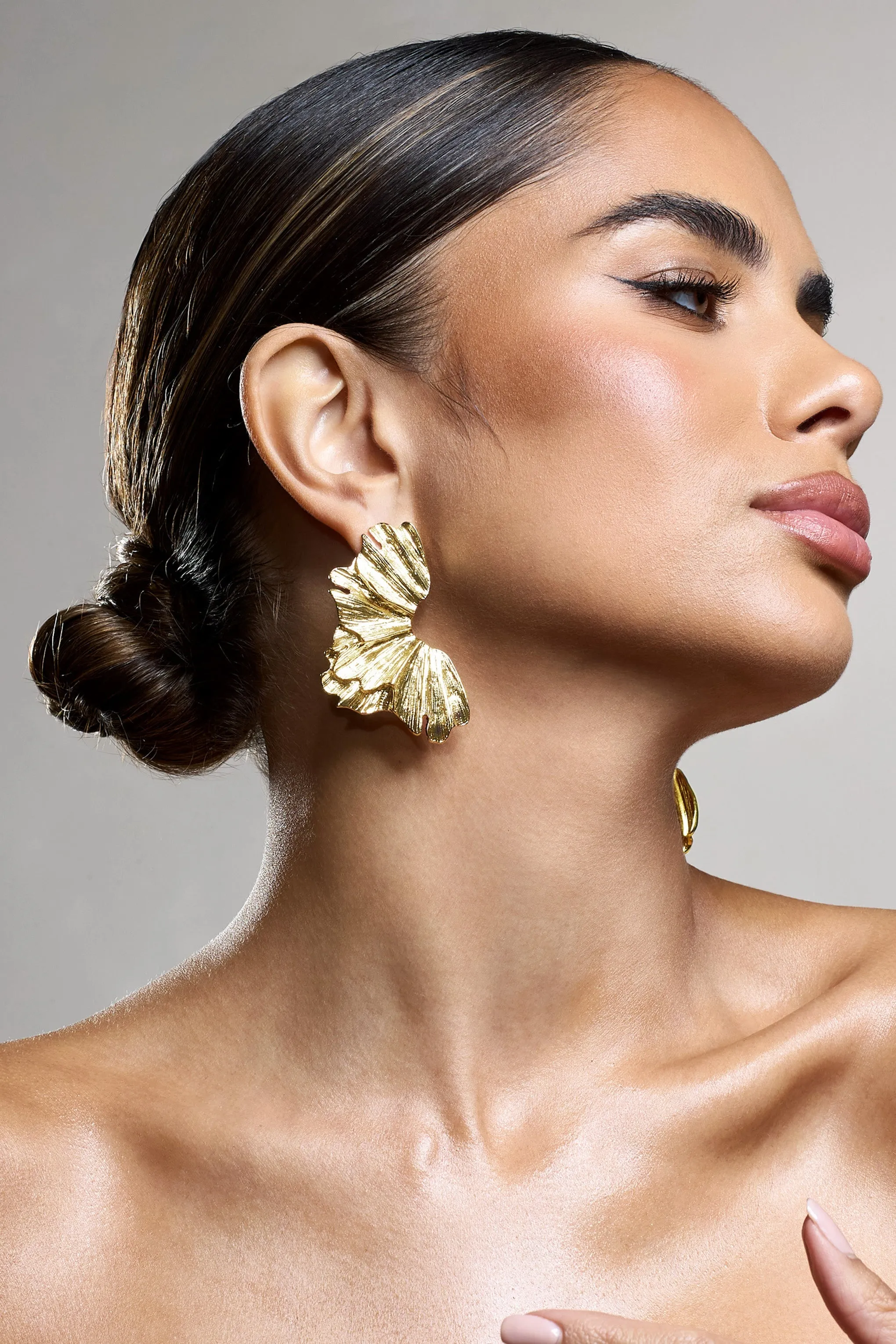 Ulyana | Gold Textured Abstract Earrings sold by Club L London