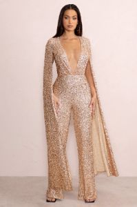 Noella | Gold Sequin Wide Leg Plunge Jumpsuit with Floor Length Cape Sleeves sold by Club L London