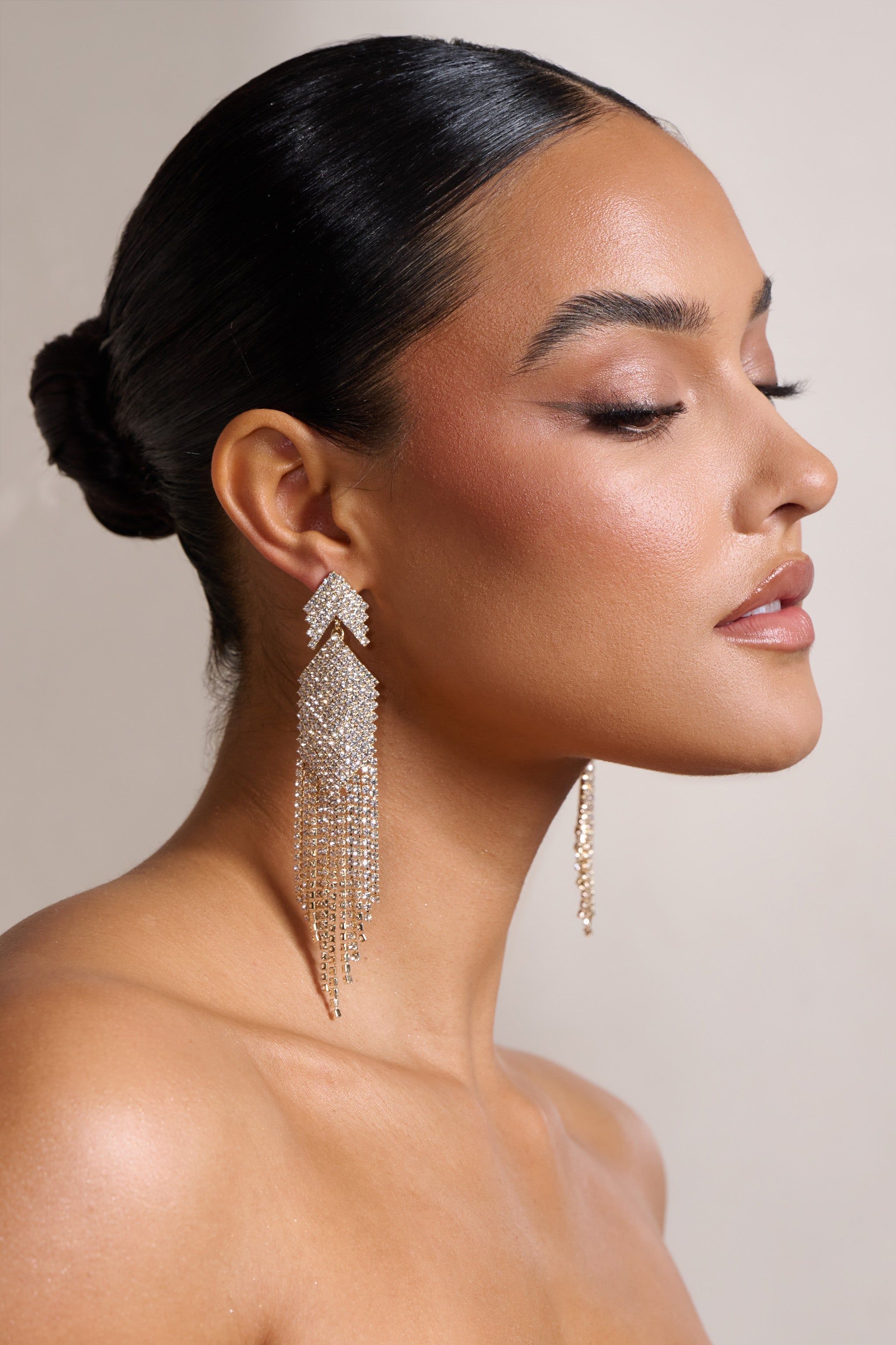Gabbie | Gold Diamante Tassel Drop Earrings sold by Club L London product image thumbnail 3