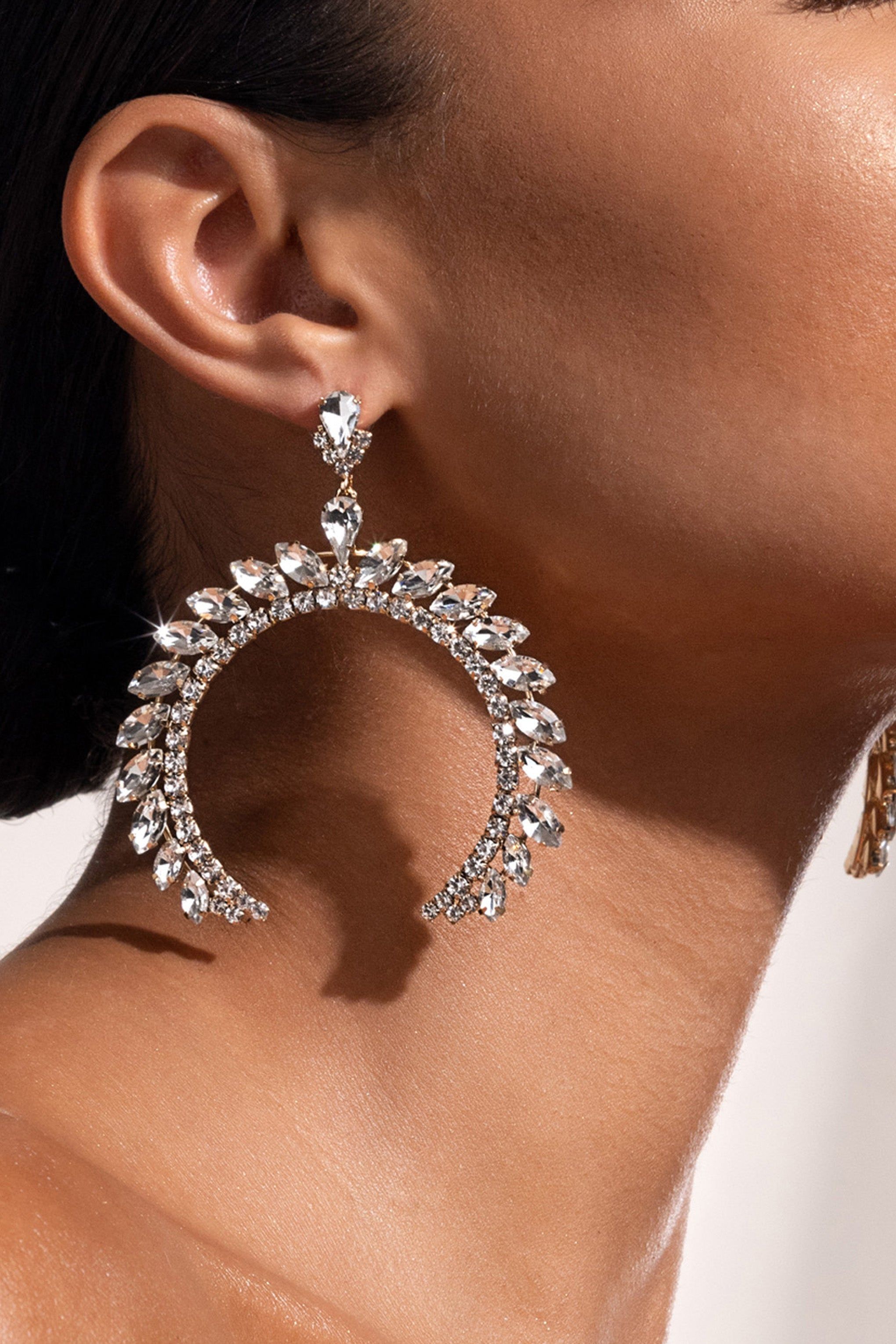 Eleonora | Gold Crystal Arched Shape Drop Earrings sold by Club L London product image thumbnail 3