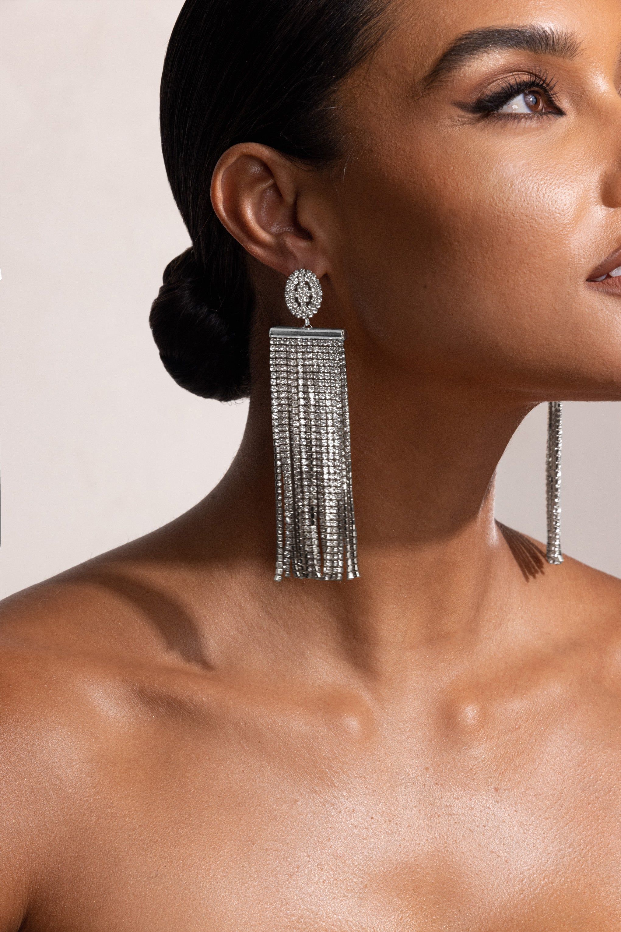Diletta | Silver Rhinestone Tassel Drop Earrings sold by Club L London product image thumbnail 3