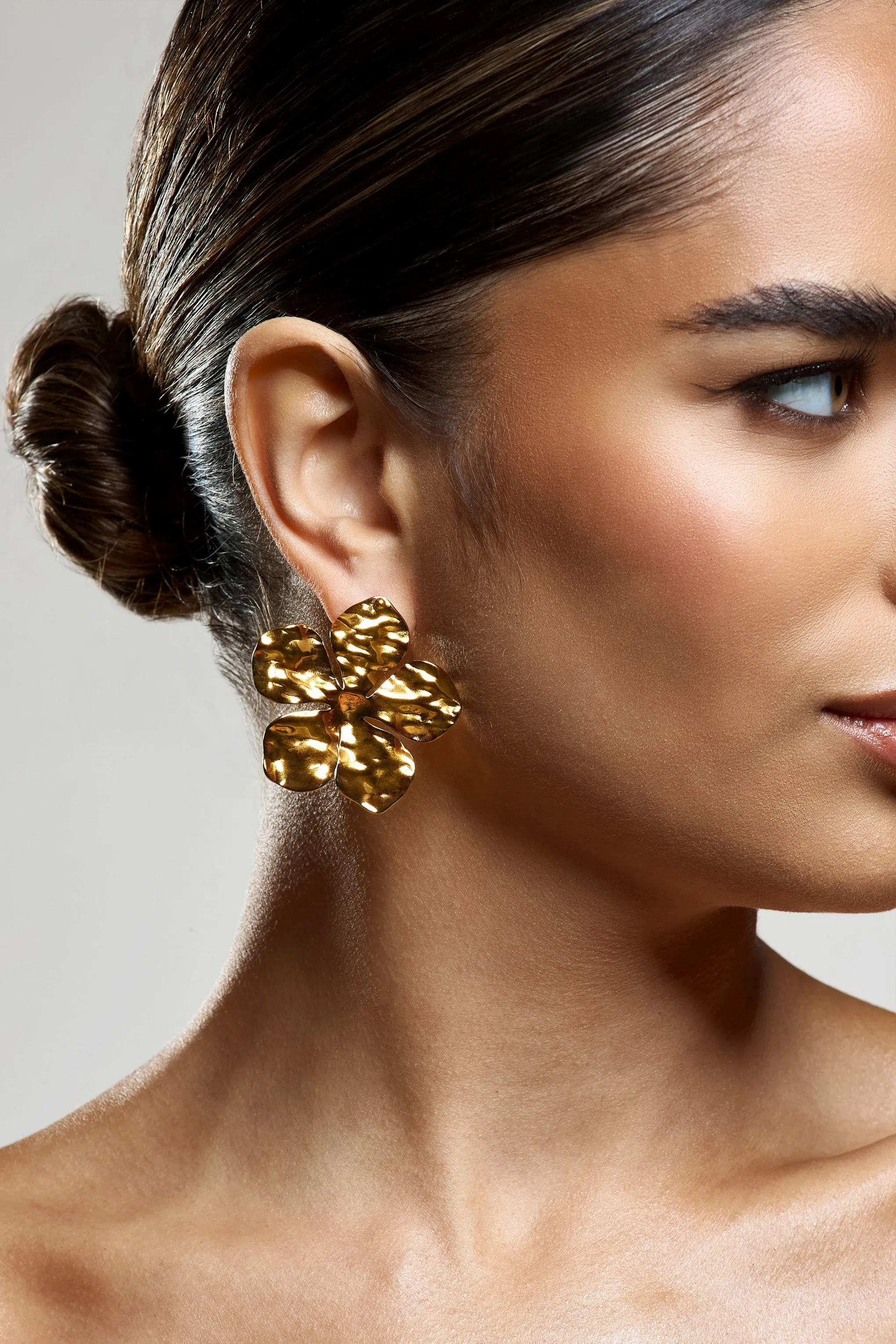 Kalina | Gold Flower Earrings With Hammered Finish sold by Club L London product image thumbnail 4