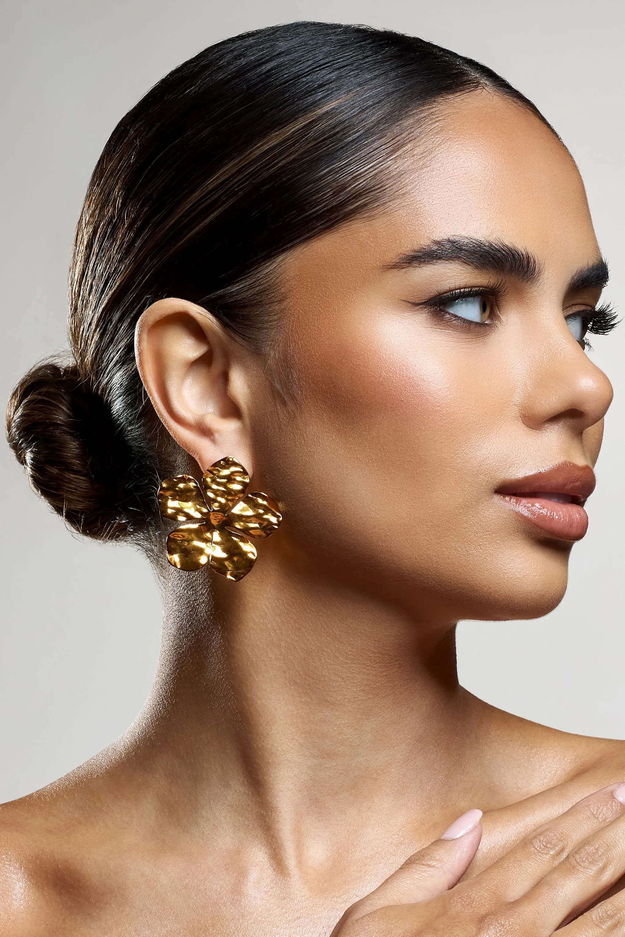 Kalina | Gold Flower Earrings With Hammered Finish sold by Club L London product image thumbnail 3