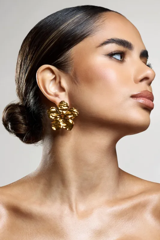 Kalina | Gold Flower Earrings With Hammered Finish sold by Club L London